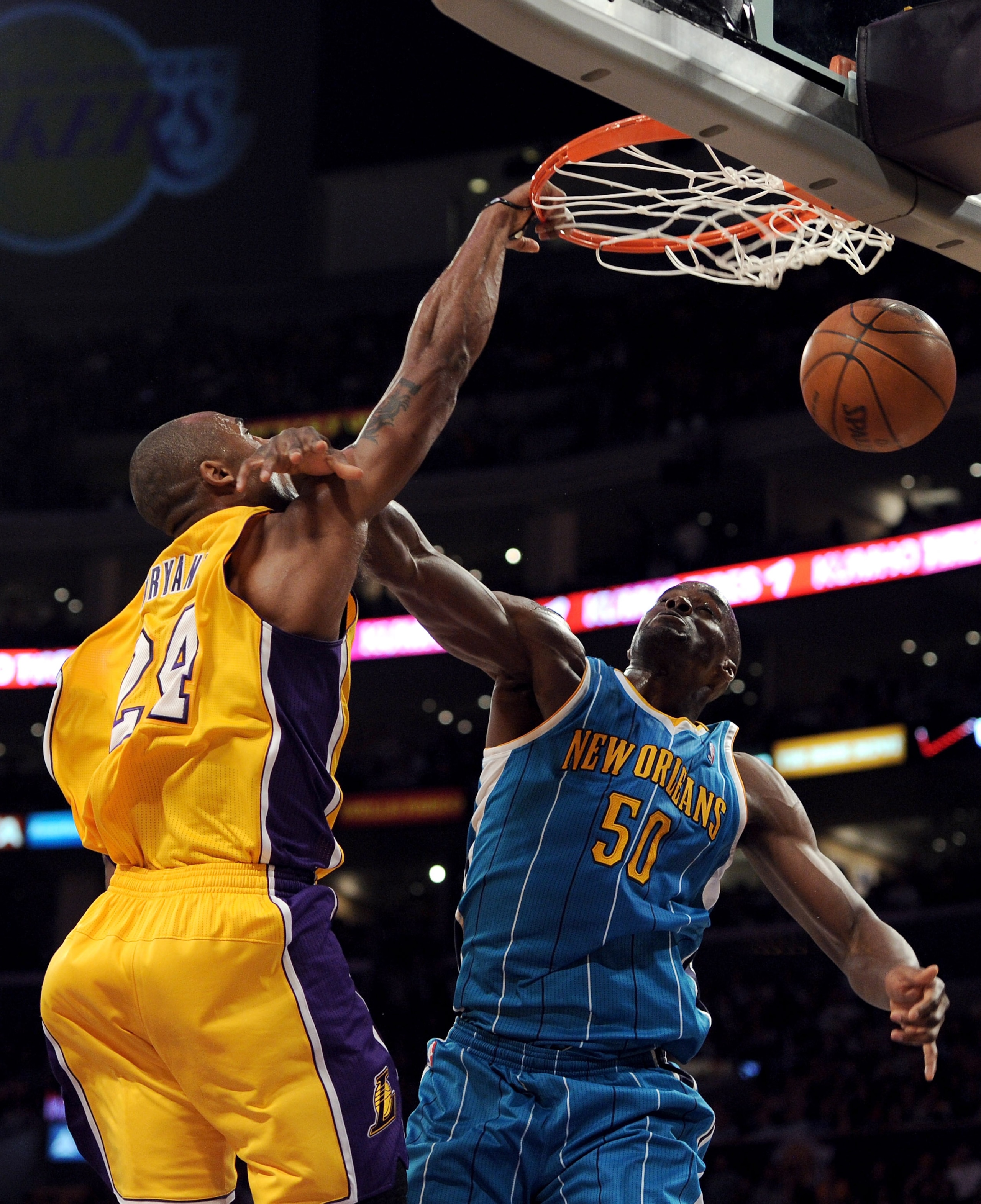 LOS ANGELES, CA - APRIL 26: Kobe Bryant #24 of the Los Angeles Lakers dunks the ball over Emeka Okafor #50 of the New Orleans Hornets in the second quarter in Game Five of the Western Conference Quarterfinals in the 2011 NBA Playoffs on April 26, 2011 at LOS ANGELES, CA - APRIL 26: Kobe Bryant #24 of the Los Angeles Lakers dunks the ball over Emeka Okafor #50 of the New Orleans Hornets in the second quarter in Game Five of the Western Conference Quarterfinals in the 2011 NBA Playoffs on April 26, 2011 at