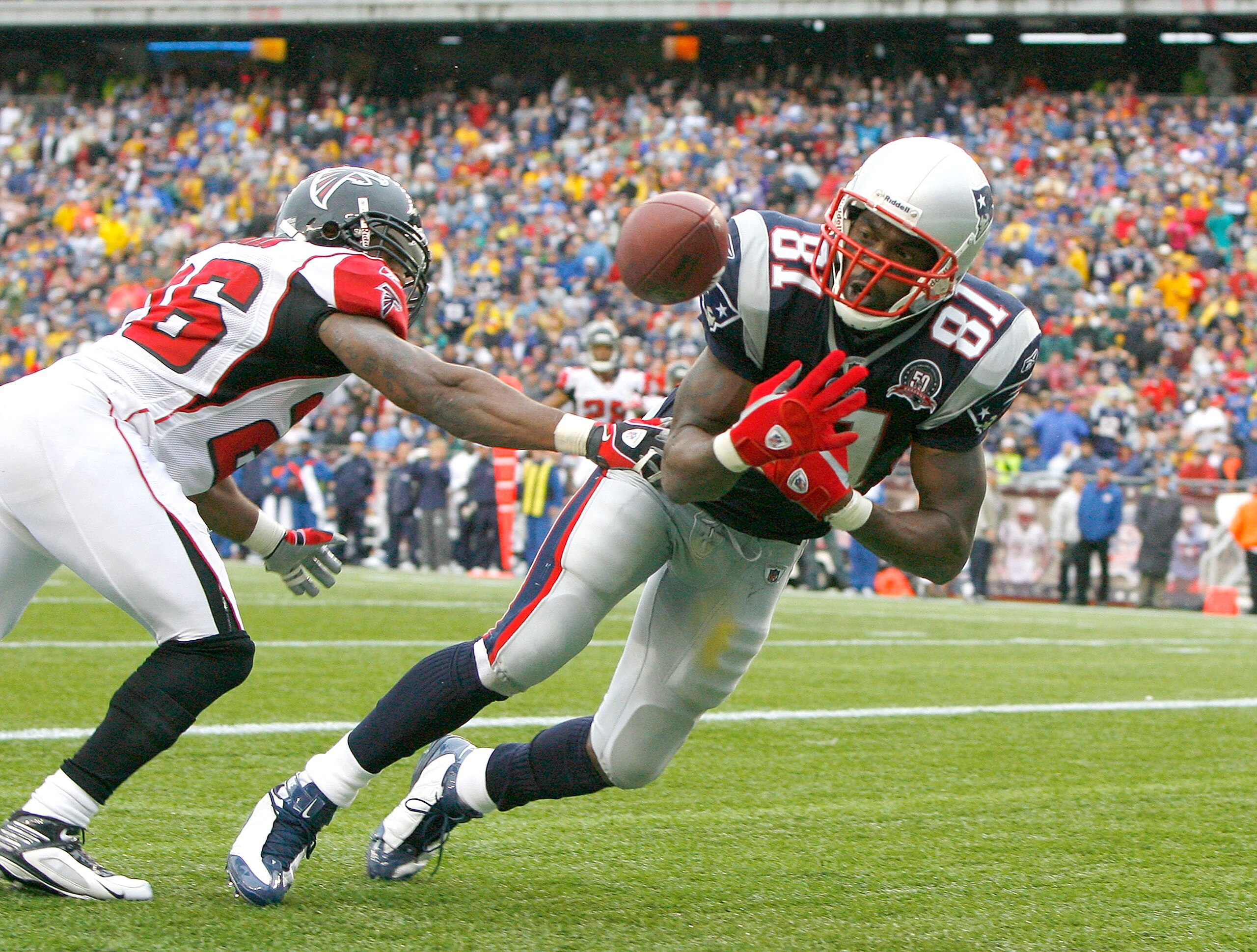 FOXBORO, MA - SEPTEMBER 27: Erik Coleman #26 of the Atlanta Falcons knocks the ball away from the hands of Randy Moss #81 of the New England Patriots in the fourth quarter at Gillette Stadium on September 27, 2009 in Foxboro, Massachusetts. The Patriots FOXBORO, MA - SEPTEMBER 27: Erik Coleman #26 of the Atlanta Falcons knocks the ball away from the hands of Randy Moss #81 of the New England Patriots in the fourth quarter at Gillette Stadium on September 27, 2009 in Foxboro, Massachusetts. The Patriots