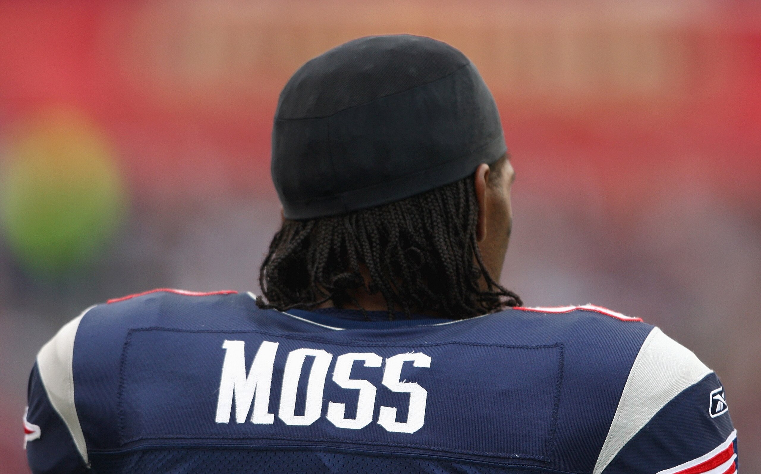 FOXBORO, MA - OCTOBER 7: Randy Moss #81 of the New England Patriots looks on against the Cleveland Browns during the NFL game on October 7, 2007 at Gillette Stadium in Foxboro, Massachusetts. (Photo by Elsa/Getty Images) FOXBORO, MA - OCTOBER 7: Randy Moss #81 of the New England Patriots looks on against the Cleveland Browns during the NFL game on October 7, 2007 at Gillette Stadium in Foxboro, Massachusetts. (Photo by Elsa/Getty Images)