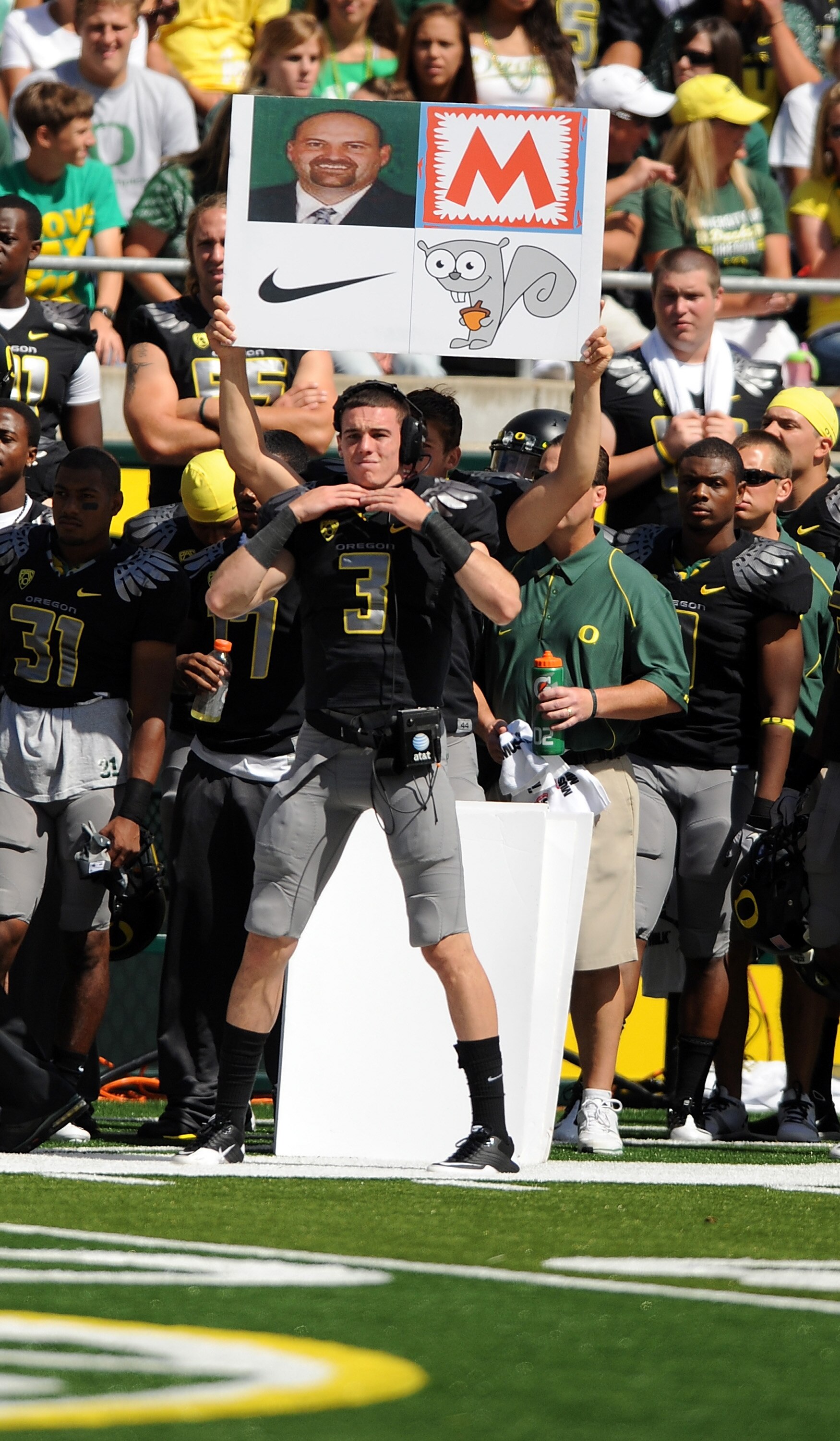 EUGENE, OR - SEPTEMBER 04:  Quarterback Bryan Bennett #3 of the Oregon Ducks signals in a play in front of the signal boards that the Ducks use to call plays during the game against the New Mexico Lobos at Autzen Stadium on September 4, 2010 in Eugene, Or