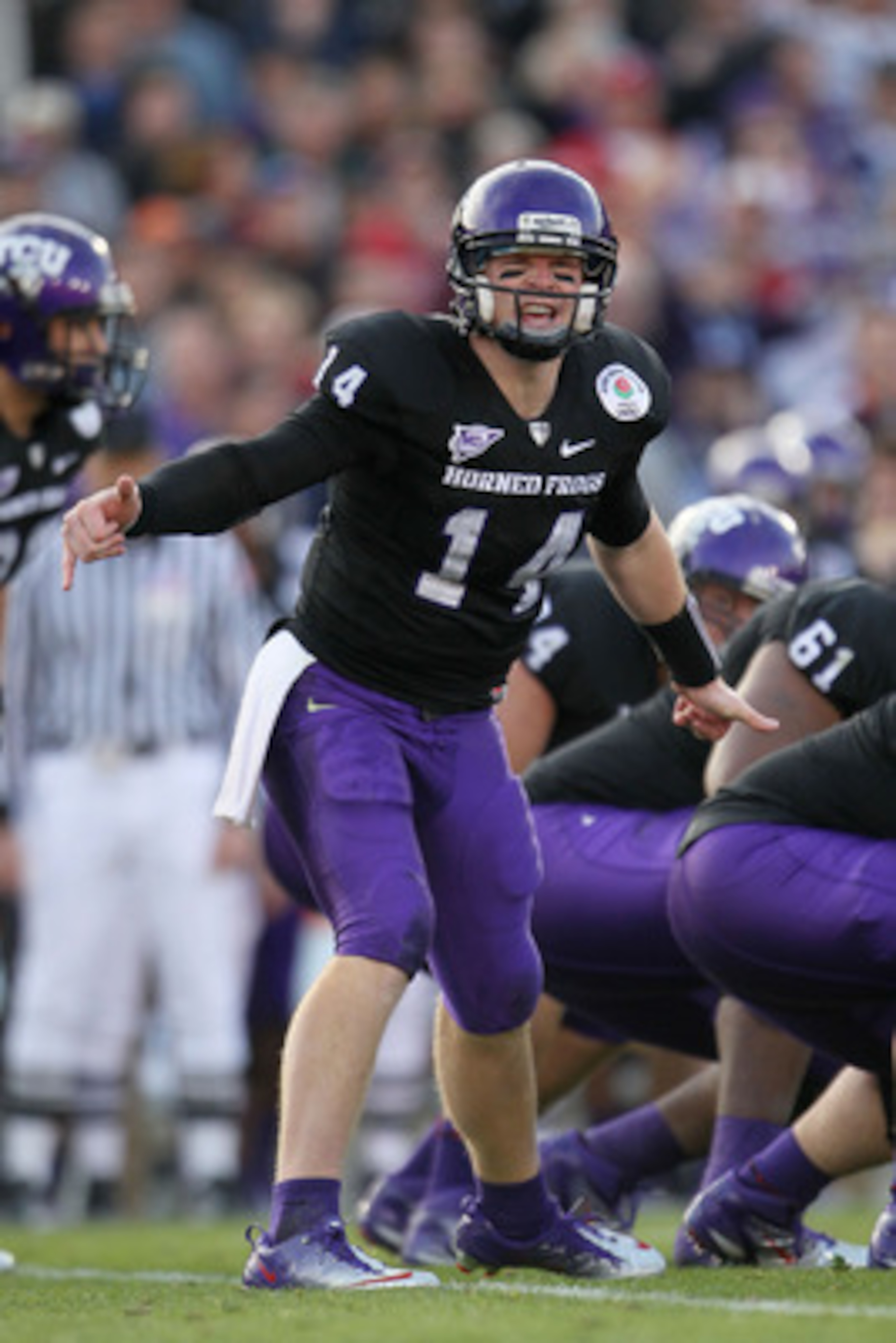 PASADENA, CA - JANUARY 01: Quarterback Andy Dalton #14 of the TCU Horned Frogs signals a play against the Wisconsin Badgers during the 97th Rose Bowl game on January 1, 2011 in Pasadena, California. (Photo by Jeff Gross/Getty Images) PASADENA, CA - JANUARY 01: Quarterback Andy Dalton #14 of the TCU Horned Frogs signals a play against the Wisconsin Badgers during the 97th Rose Bowl game on January 1, 2011 in Pasadena, California. (Photo by Jeff Gross/Getty Images)