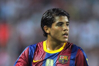 SEVILLE, SPAIN - AUGUST 14: Jonathan Dos Santos of Barcelona during the Supercopa, first leg, match between Sevilla and Barcelona at the Sanchez Pizjuan stadium  on August 14, 2010 in Seville, Spain.  (Photo by Denis Doyle/Getty Images)
