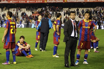 VALENCIA, SPAIN - APRIL 20:  FC Barcelona are seen after  being defeated  at the end of the Copa del Rey Final between Real Madrid and Barcelona at Estadio Mestalla on April 20, 2011 in Valencia, Spain. Real Madrid won 1-0.  (Photo by David Ramos/Getty Im