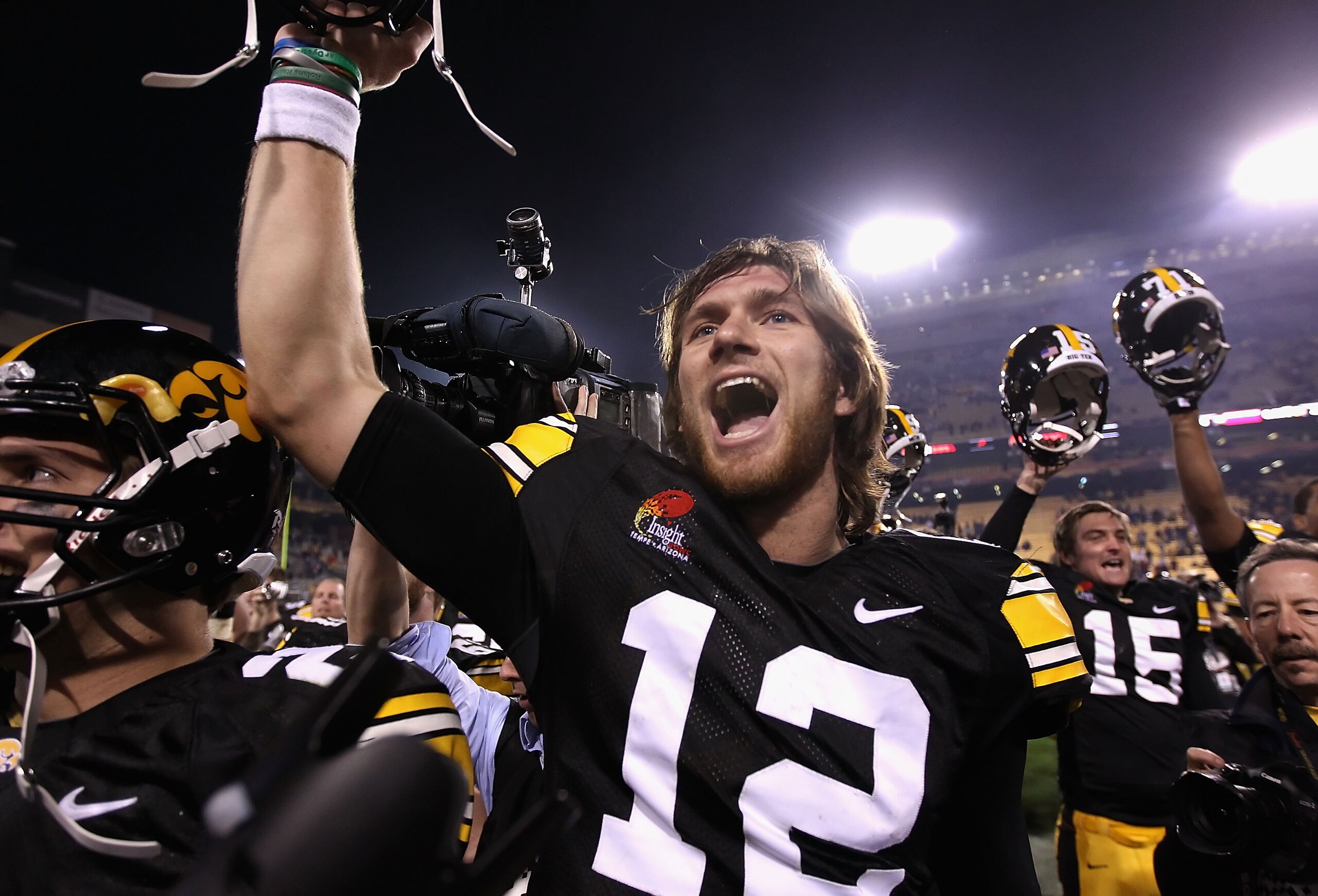 TEMPE, AZ - DECEMBER 28: Quarterback Ricky Stanzi #12 of the Iowa Hawkeyes celebrates with teammates after defeating the Missouri Tigers in the Insight Bowl at Sun Devil Stadium on December 28, 2010 in Tempe, Arizona. The Hawkeyes defeated the Tigers 27- TEMPE, AZ - DECEMBER 28: Quarterback Ricky Stanzi #12 of the Iowa Hawkeyes celebrates with teammates after defeating the Missouri Tigers in the Insight Bowl at Sun Devil Stadium on December 28, 2010 in Tempe, Arizona. The Hawkeyes defeated the Tigers 27-