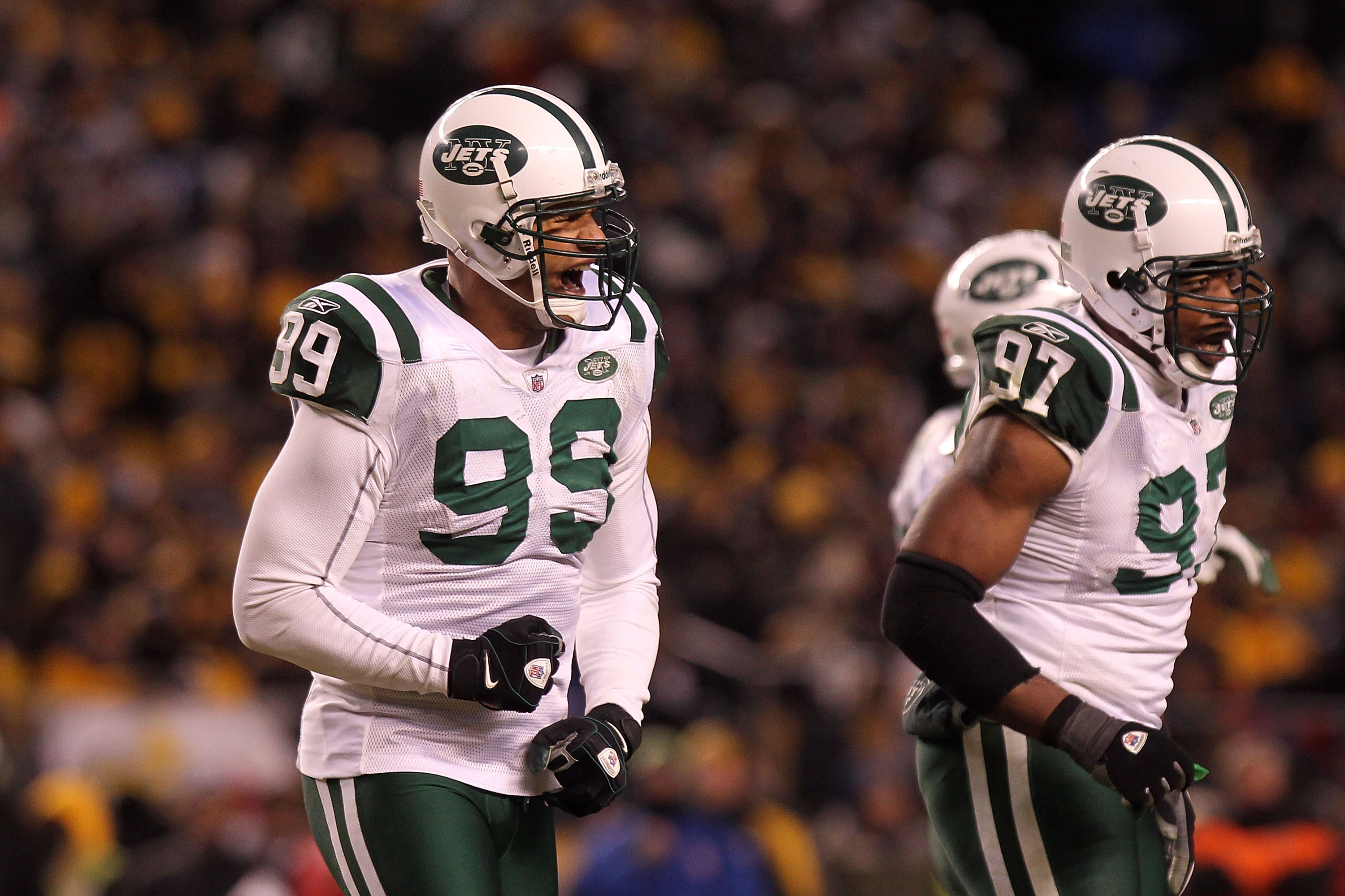 PITTSBURGH, PA - JANUARY 23:  Jason Taylor #99 of the New York Jets reacts after sacking Ben Roethlisberger #7 of the Pittsburgh Steelers as Calvin Pace #97 of the New York Jets looks on during the 2011 AFC Championship game at Heinz Field on January 23,