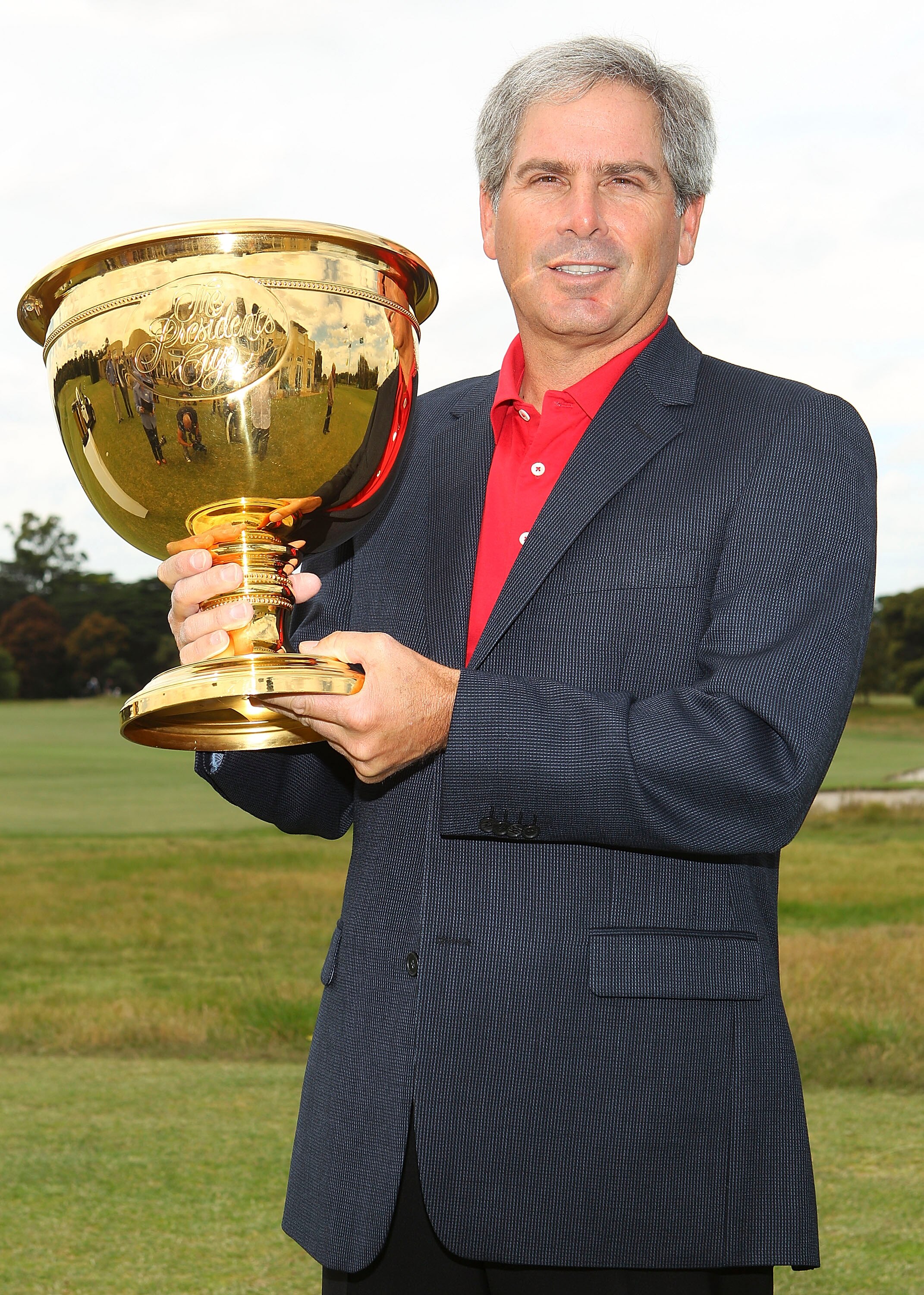 MELBOURNE, AUSTRALIA - NOVEMBER 29:  Fred Couples of Australia poses with the Cup during Presidents Cup Captains Day at Royal Melbourne Gof Course on November 29, 2010 in Melbourne, Australia.  (Photo by Lucas Dawson/Getty Images)