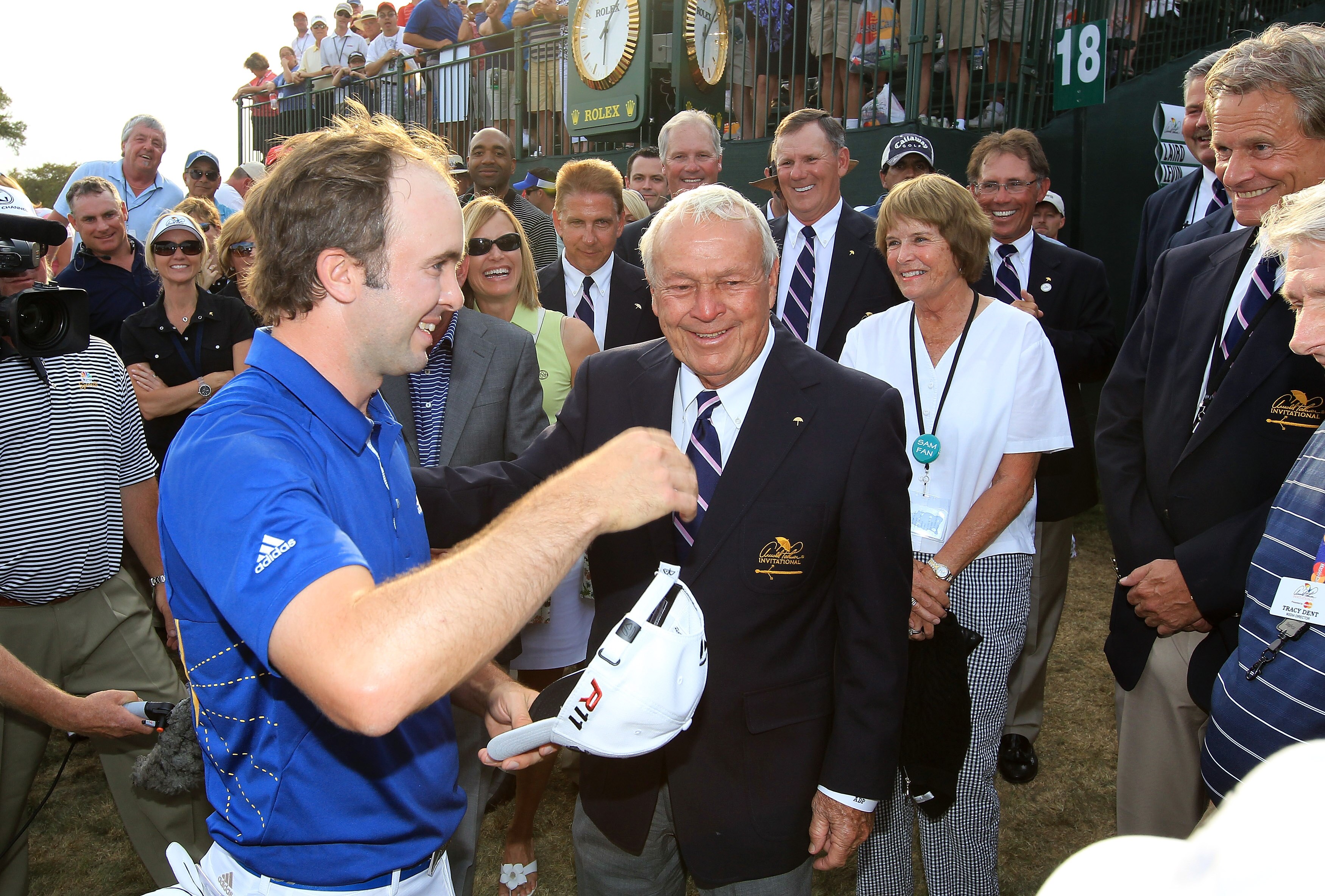ORLANDO, FL - MARCH 27:  Martin Laird of Scotland is greeted by Arnold Palmer of the USA after he had secured victory on the 18th green during the final round of the 2011 Arnold Palmer Invitational presented by Mastercard at the Bay Hill Lodge and Country