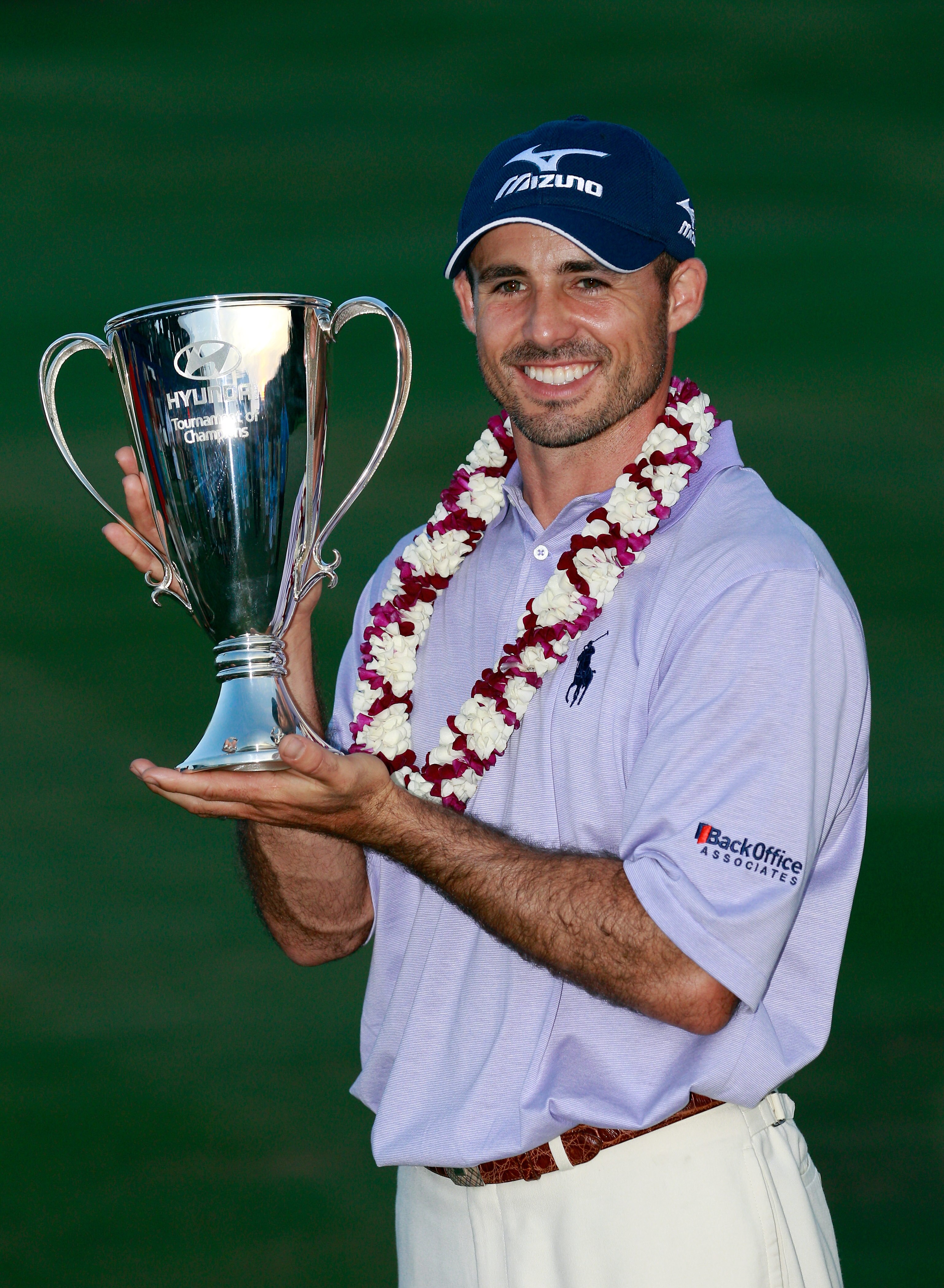 KAPALUA, HI - JANUARY 09:  Jonathan Byrd poses with the trophy after winning the Hyundai Tournament of Champions at the Plantation course on January 9, 2011 in Kapalua, Hawaii.  (Photo by Sam Greenwood/Getty Images)