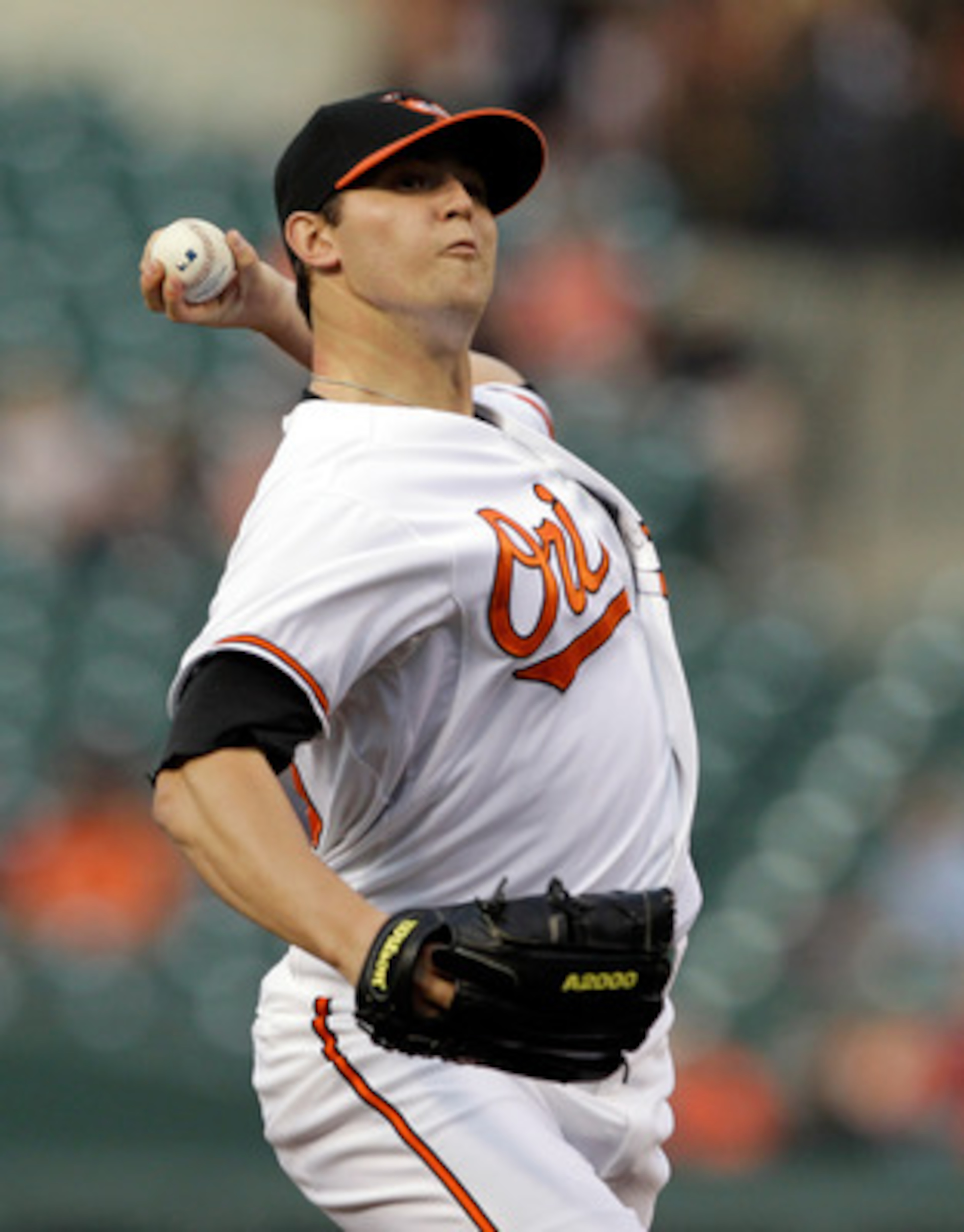 BALTIMORE, MD - APRIL 26: Pitcher Zach Britton #53 of the Baltimore Orioles delivers to a Boston Red Soxbatter during the first inning at Oriole Park at Camden Yards on April 26, 2011 in Baltimore, Maryland.  (Photo by Rob Carr/Getty Images)