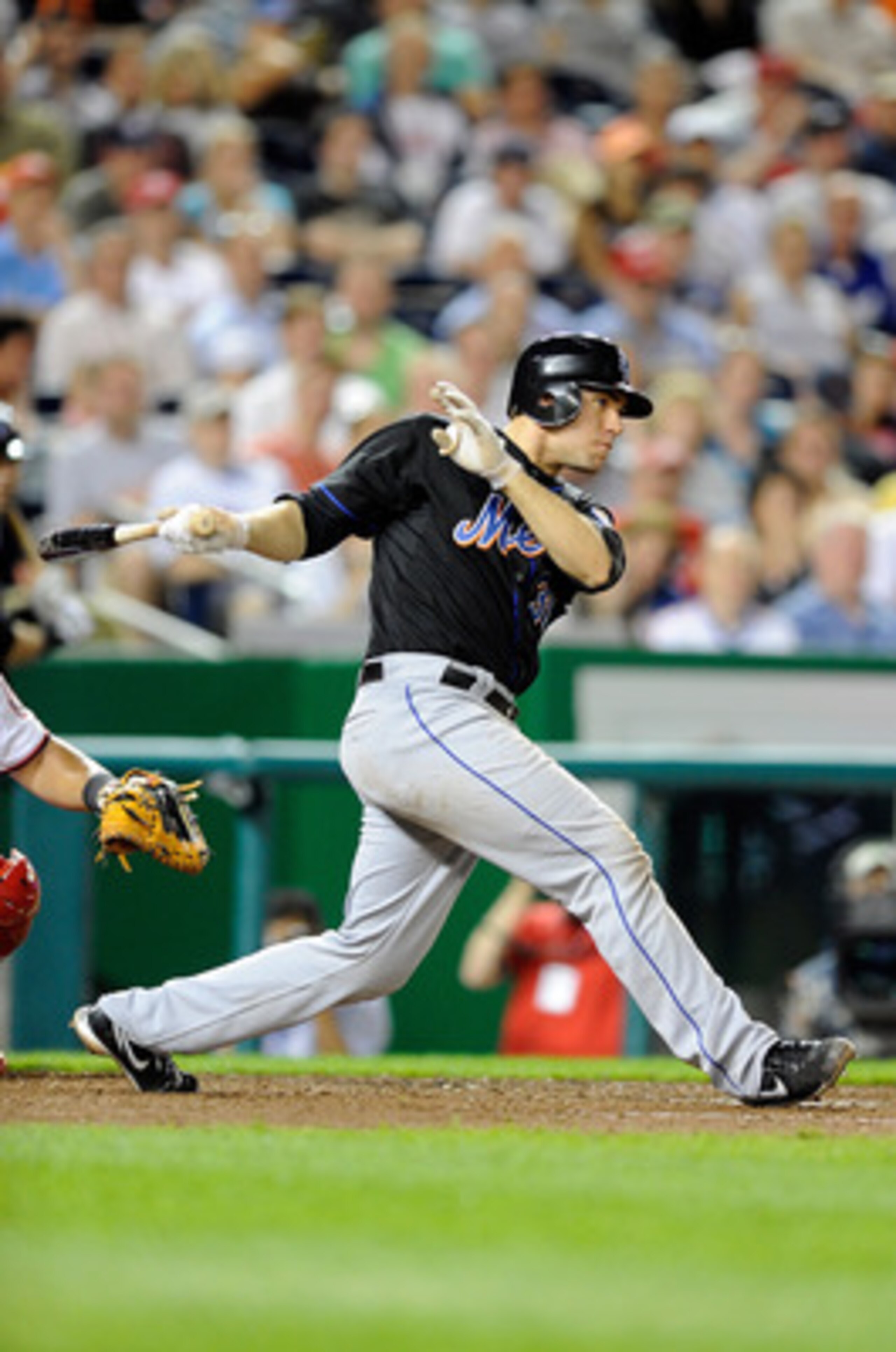 WASHINGTON, DC - APRIL 26:  Josh Thole #30 of the New York Mets bats in the eighth inning against the Washington Nationals at Nationals Park on April 26, 2011 in Washington, DC.  New York won the game 6-4. (Photo by Greg Fiume/Getty Images)
