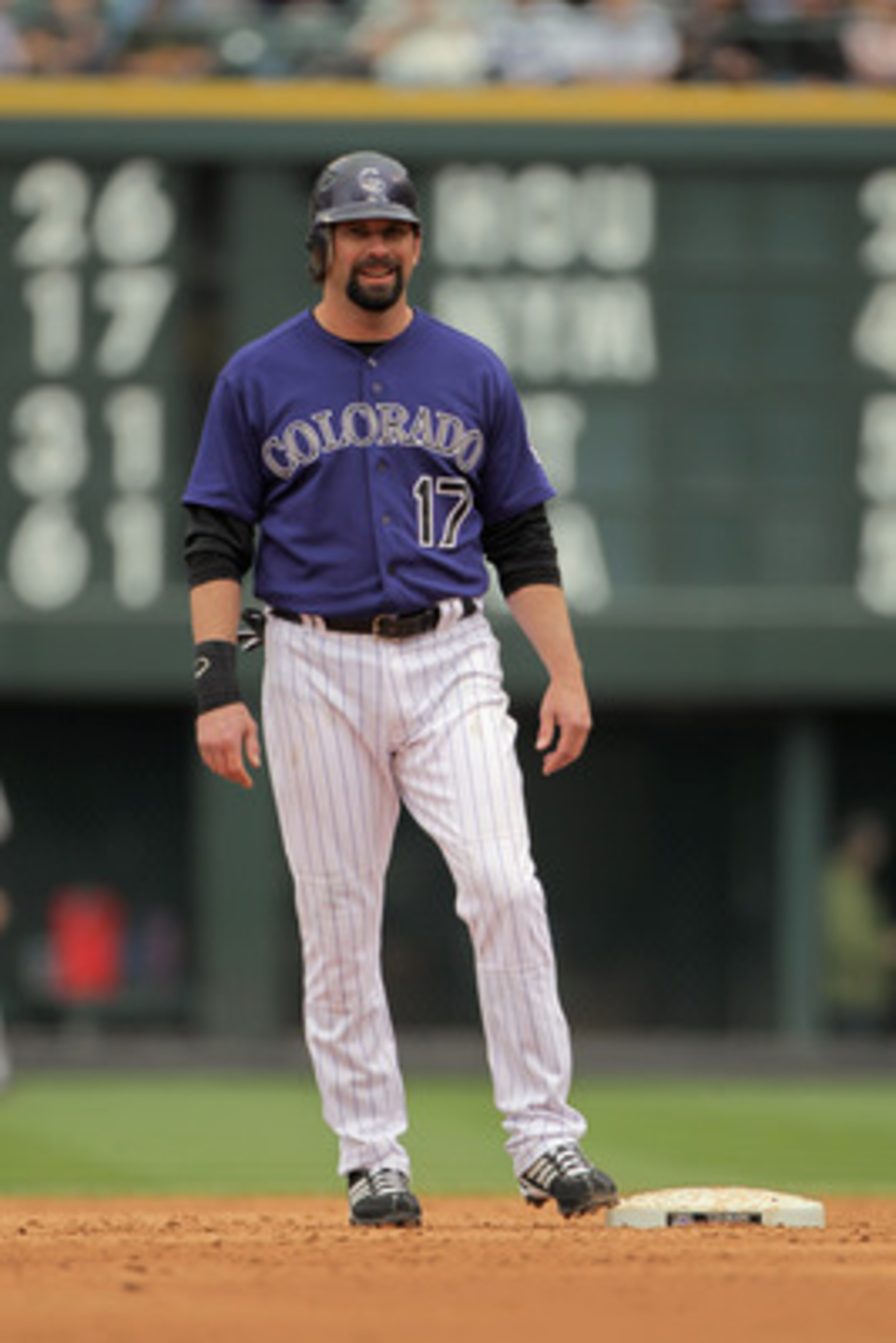 DENVER, CO - APRIL 20:  First baseman Todd Helton #17 of the Colorado Rockies looks on from second base after hitting a double against the San Francisco Giants at Coors Field on April 20, 2011 in Denver, Colorado.  (Photo by Doug Pensinger/Getty Images)