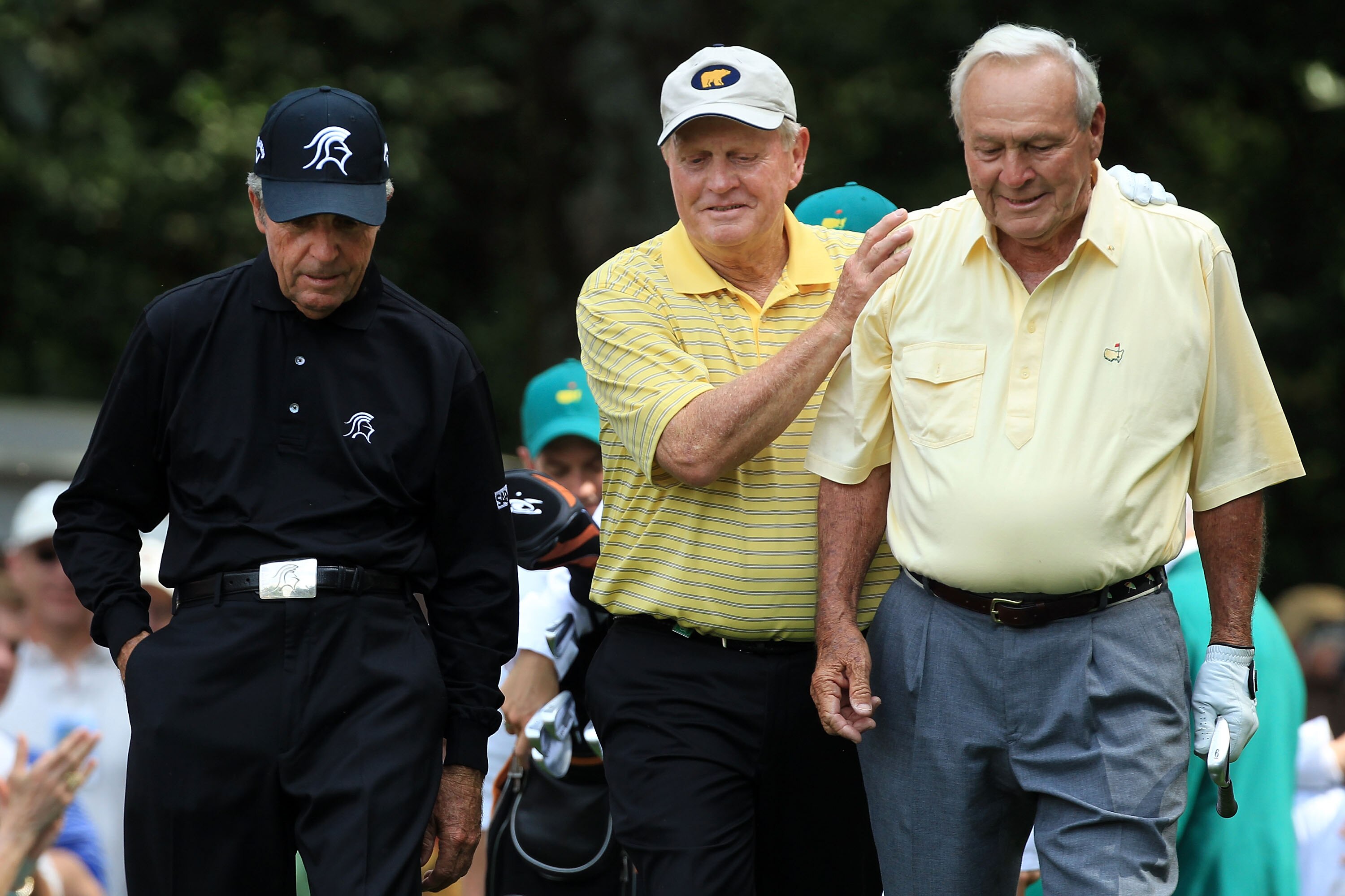 AUGUSTA, GA - APRIL 07:  (L-R) Gary Player of South Africa, Jack Nicklaus and Arnold Palmer walk off a tee box during the Par 3 Contest prior to the 2010 Masters Tournament at Augusta National Golf Club on April 7, 2010 in Augusta, Georgia.  (Photo by Dav