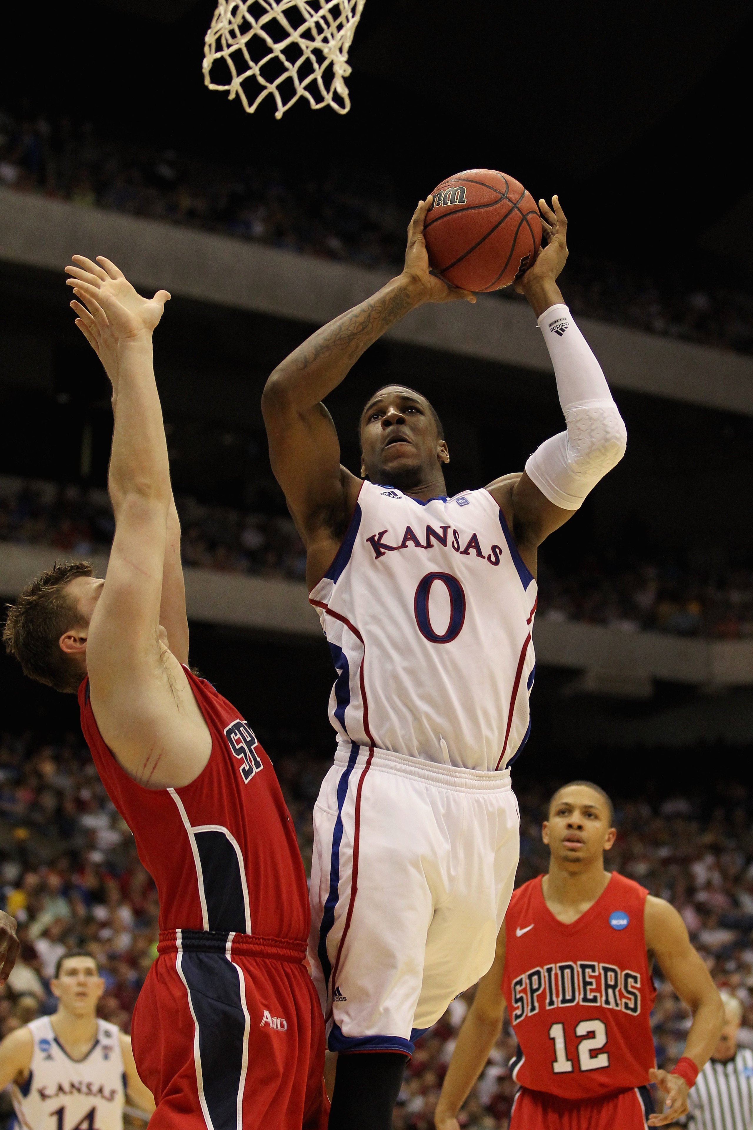 SAN ANTONIO, TX - MARCH 25: Thomas Robinson #0 of the Kansas Jayhawks goes to the basket against the Richmond Spiders during the southwest regional of the 2011 NCAA men's basketball tournament at the Alamodome on March 25, 2011 in San Antonio, Texas. (P SAN ANTONIO, TX - MARCH 25: Thomas Robinson #0 of the Kansas Jayhawks goes to the basket against the Richmond Spiders during the southwest regional of the 2011 NCAA men's basketball tournament at the Alamodome on March 25, 2011 in San Antonio, Texas. (P