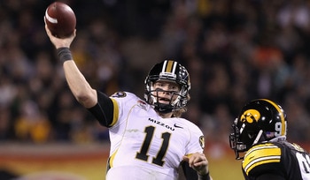 TEMPE, AZ - DECEMBER 28:  Quarterback Blaine Gabbert #11 of the Missouri Tigers throws a pass during the Insight Bowl against the Iowa Hawkeyes at Sun Devil Stadium on December 28, 2010 in Tempe, Arizona.  The Hawkeyes defeated the Tigers 27-24. (Photo by