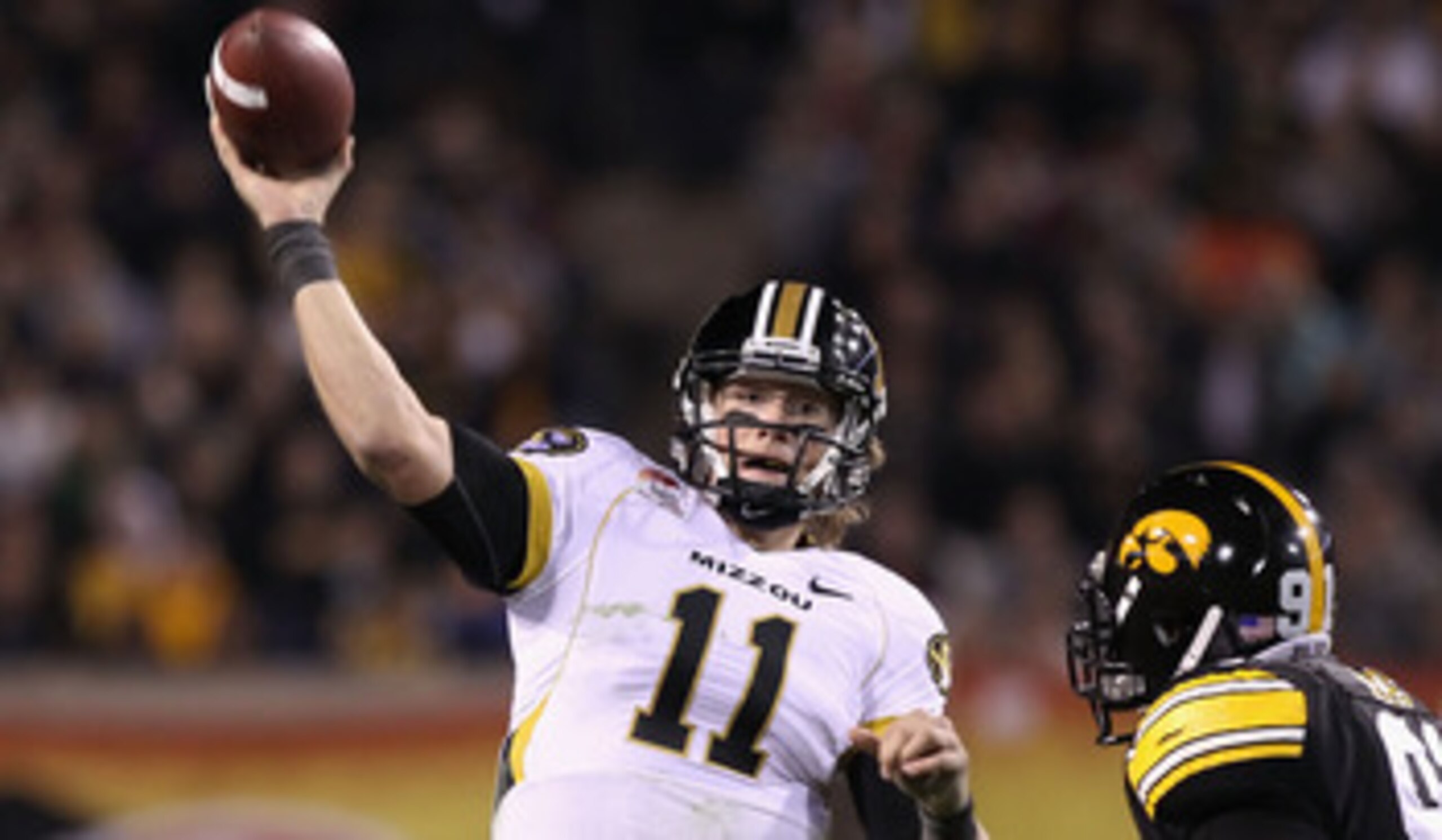 TEMPE, AZ - DECEMBER 28:  Quarterback Blaine Gabbert #11 of the Missouri Tigers throws a pass during the Insight Bowl against the Iowa Hawkeyes at Sun Devil Stadium on December 28, 2010 in Tempe, Arizona.  The Hawkeyes defeated the Tigers 27-24. (Photo by