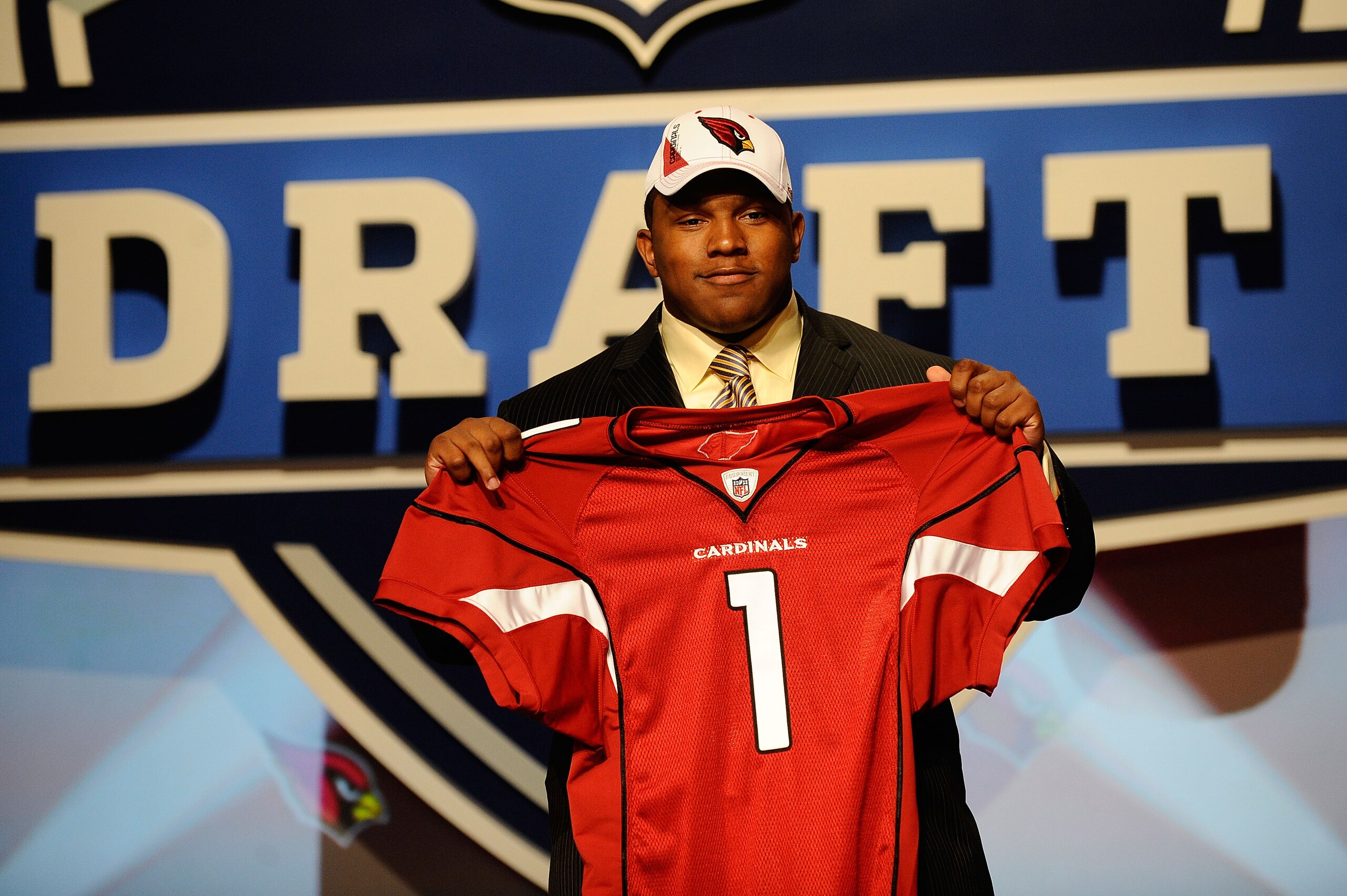 NEW YORK - APRIL 22: Dan Williams from the Tennessee Volunteers holds up a Arizona Carinals jersey after he was selected number 26 overall by the Cardinals during the first round of the 2010 NFL Draft at Radio City Music Hall on April 22, 2010 in New Yor NEW YORK - APRIL 22: Dan Williams from the Tennessee Volunteers holds up a Arizona Carinals jersey after he was selected number 26 overall by the Cardinals during the first round of the 2010 NFL Draft at Radio City Music Hall on April 22, 2010 in New Yor
