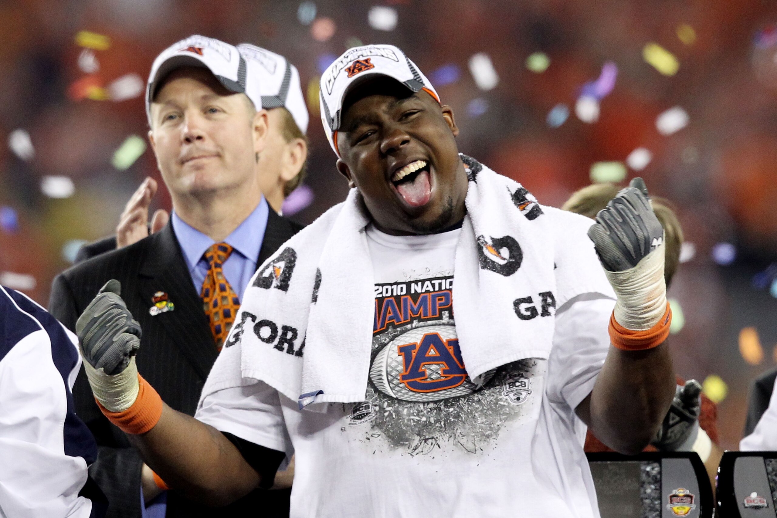 GLENDALE, AZ - JANUARY 10:  Nick Fairley #90 of the Auburn Tigers celebrates the Tigers 22-19 victory against the Oregon Ducks during the Tostitos BCS National Championship Game at University of Phoenix Stadium on January 10, 2011 in Glendale, Arizona.  (