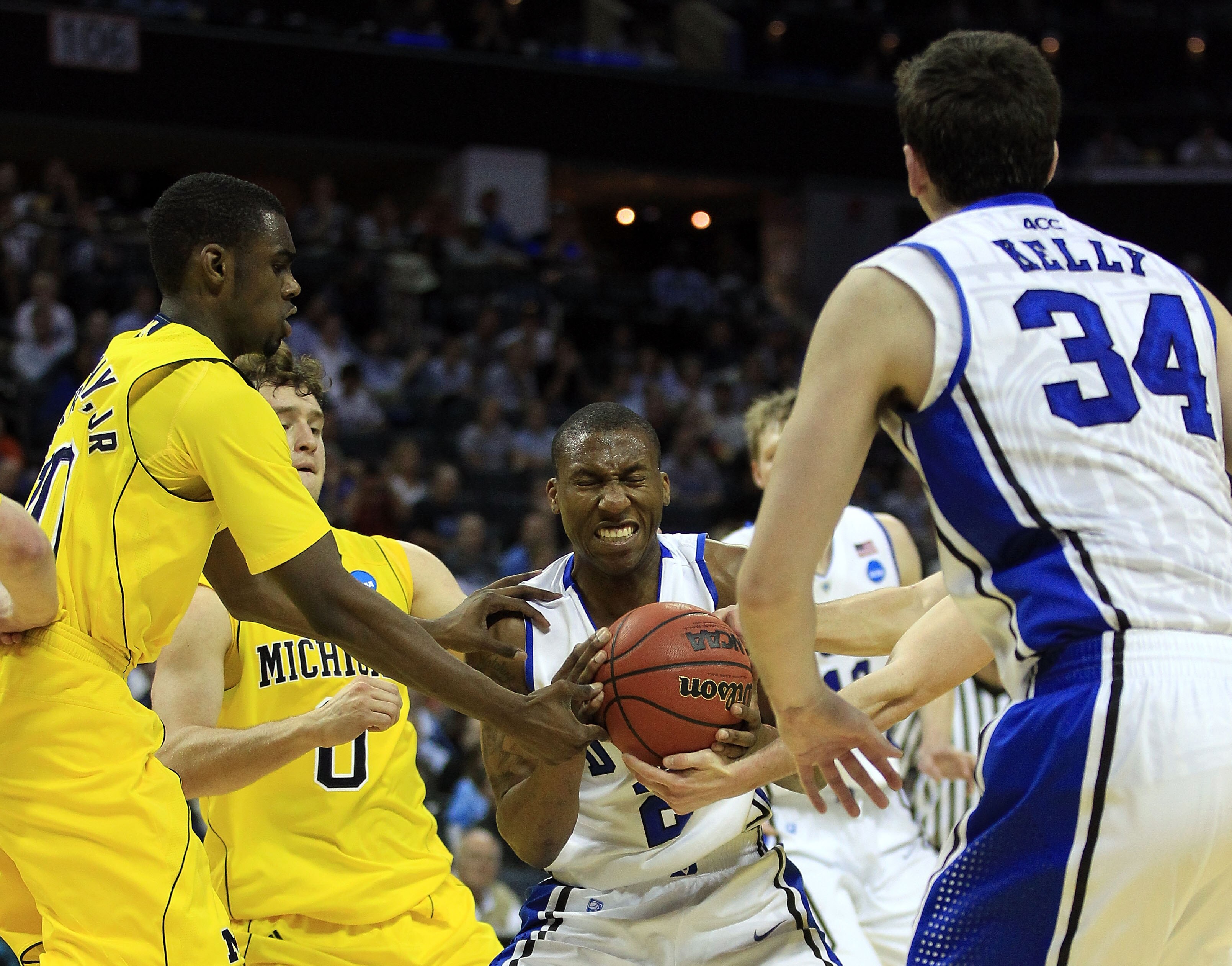 CHARLOTTE, NC - MARCH 20:  Nolan Smith #2 of the Duke Blue Devils moves the ball while taking on the Michigan Wolverines during the third round of the 2011 NCAA men's basketball tournament at Time Warner Cable Arena on March 20, 2011 in Charlotte, North C