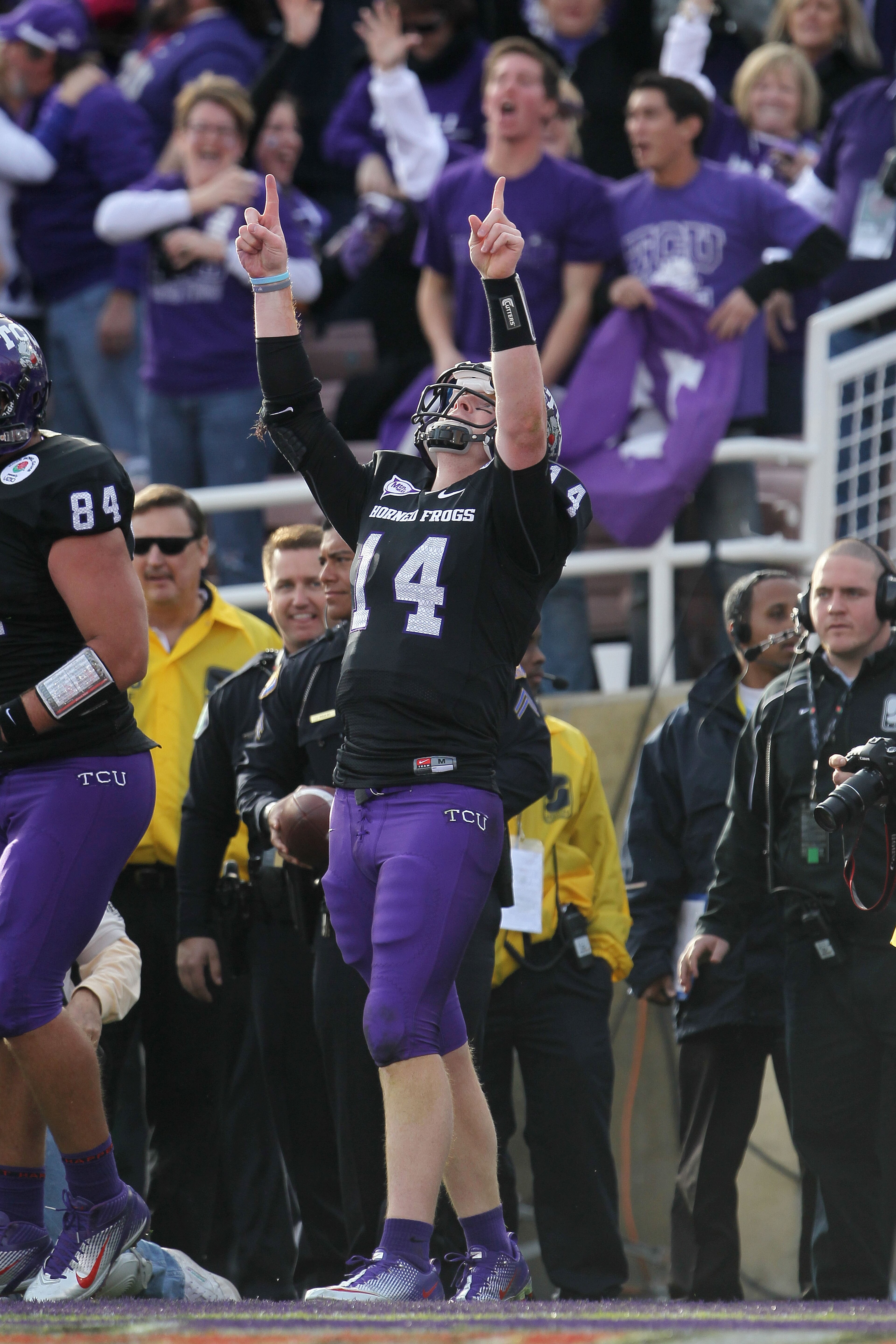 PASADENA, CA - JANUARY 01: Quarterback Andy Dalton #14 of the TCU Horned Frogs celebrates after a touchdown against the Wisconsin Badgers in the first quarter of the 97th Rose Bowl game on January 1, 2011 in Pasadena, California. (Photo by Jeff Gross/Ge PASADENA, CA - JANUARY 01: Quarterback Andy Dalton #14 of the TCU Horned Frogs celebrates after a touchdown against the Wisconsin Badgers in the first quarter of the 97th Rose Bowl game on January 1, 2011 in Pasadena, California. (Photo by Jeff Gross/Ge