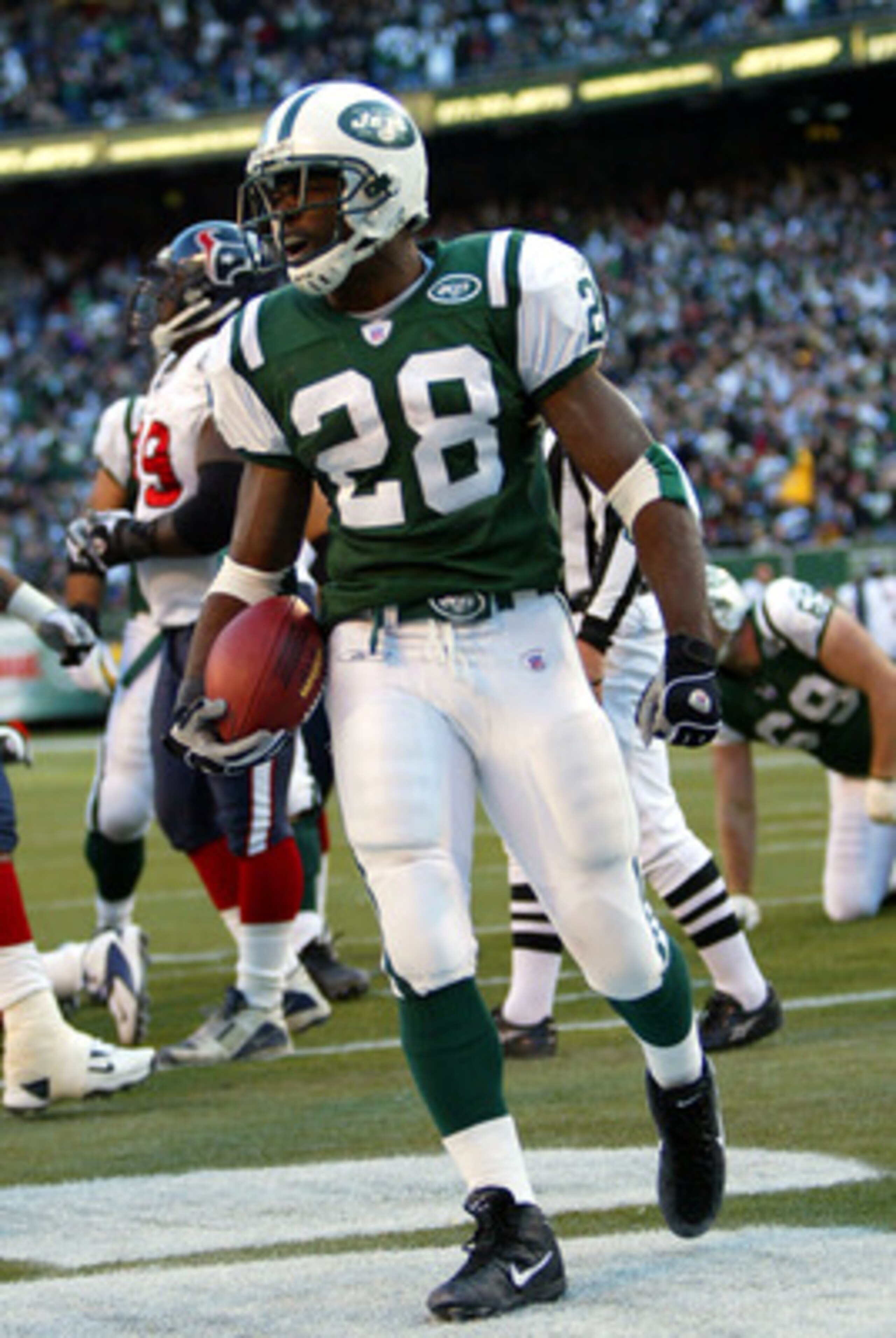 EAST RUTHERFORD, NJ - DECEMBER 5:  Curtis Martin #28 of the New York Jets celebrates his touchdown in the third quarter against the Houston Texans on December 5, 2004 at Giants Stadium in East Rutherford, New Jersey. The Jets defeated the Texans 29-7.  (P