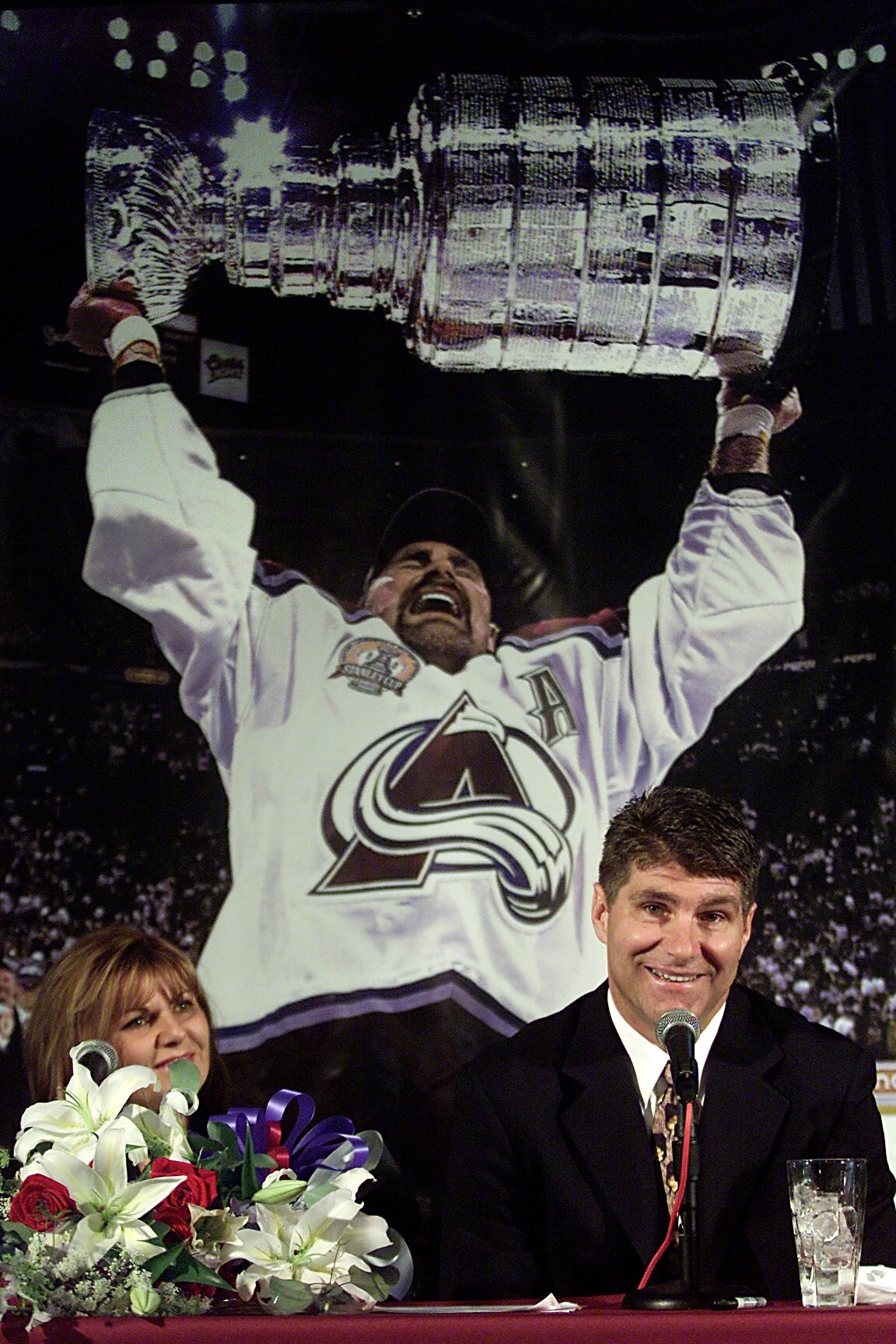 26 Jun 2001:  Veteran defenseman Ray Bourque #77 of the Colorado Avalanche smiles with his wife Christiane at his side after announcing his retirement after playing 22 seasons in the National Hockey League with the Boston Bruins and the Colorado Avalanche