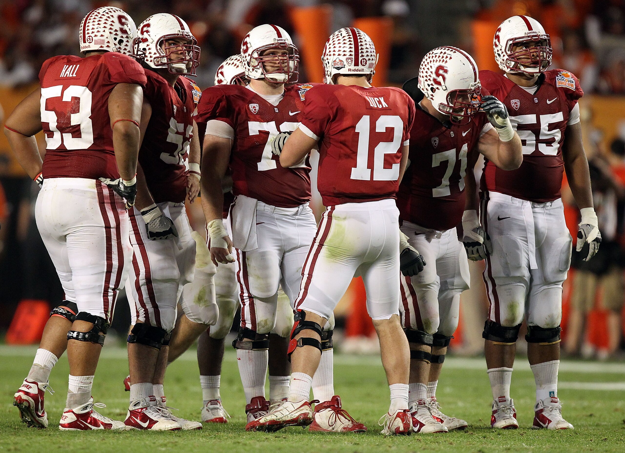 MIAMI, FL - JANUARY 03: Quarterback Andrew Luck #12 of the Stanford Cardinal calls a play in the huddle as Derek Hall #53, David DeCastro #52, Chase Beeler #72, Andrew Phillips #71 and Jonathan Martin #55 listen to the call against the Virginia Tech Hokie MIAMI, FL - JANUARY 03: Quarterback Andrew Luck #12 of the Stanford Cardinal calls a play in the huddle as Derek Hall #53, David DeCastro #52, Chase Beeler #72, Andrew Phillips #71 and Jonathan Martin #55 listen to the call against the Virginia Tech Hokie