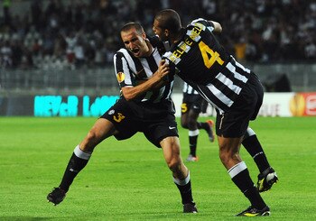 TURIN, ITALY - SEPTEMBER 16:  Giorgio Chiellini (L) of Juventus FC celebrates his goal with Felipe Melo during the Uefa Europa League group A match Juventus FC and KKS Lech Poznan at Olimpico Stadium on September 16, 2010 in Turin, Italy.  (Photo by Valer