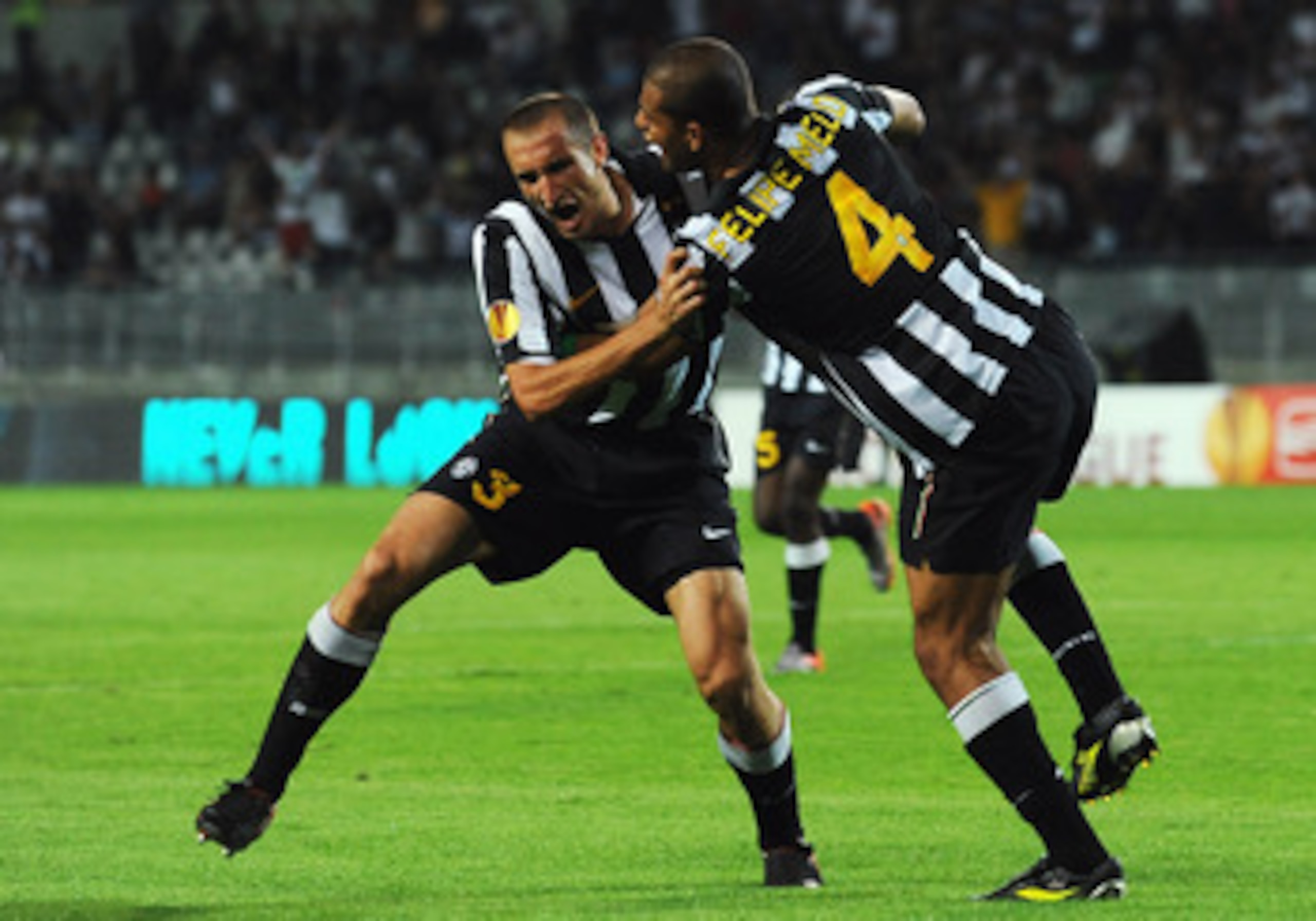 TURIN, ITALY - SEPTEMBER 16:  Giorgio Chiellini (L) of Juventus FC celebrates his goal with Felipe Melo during the Uefa Europa League group A match Juventus FC and KKS Lech Poznan at Olimpico Stadium on September 16, 2010 in Turin, Italy.  (Photo by Valer