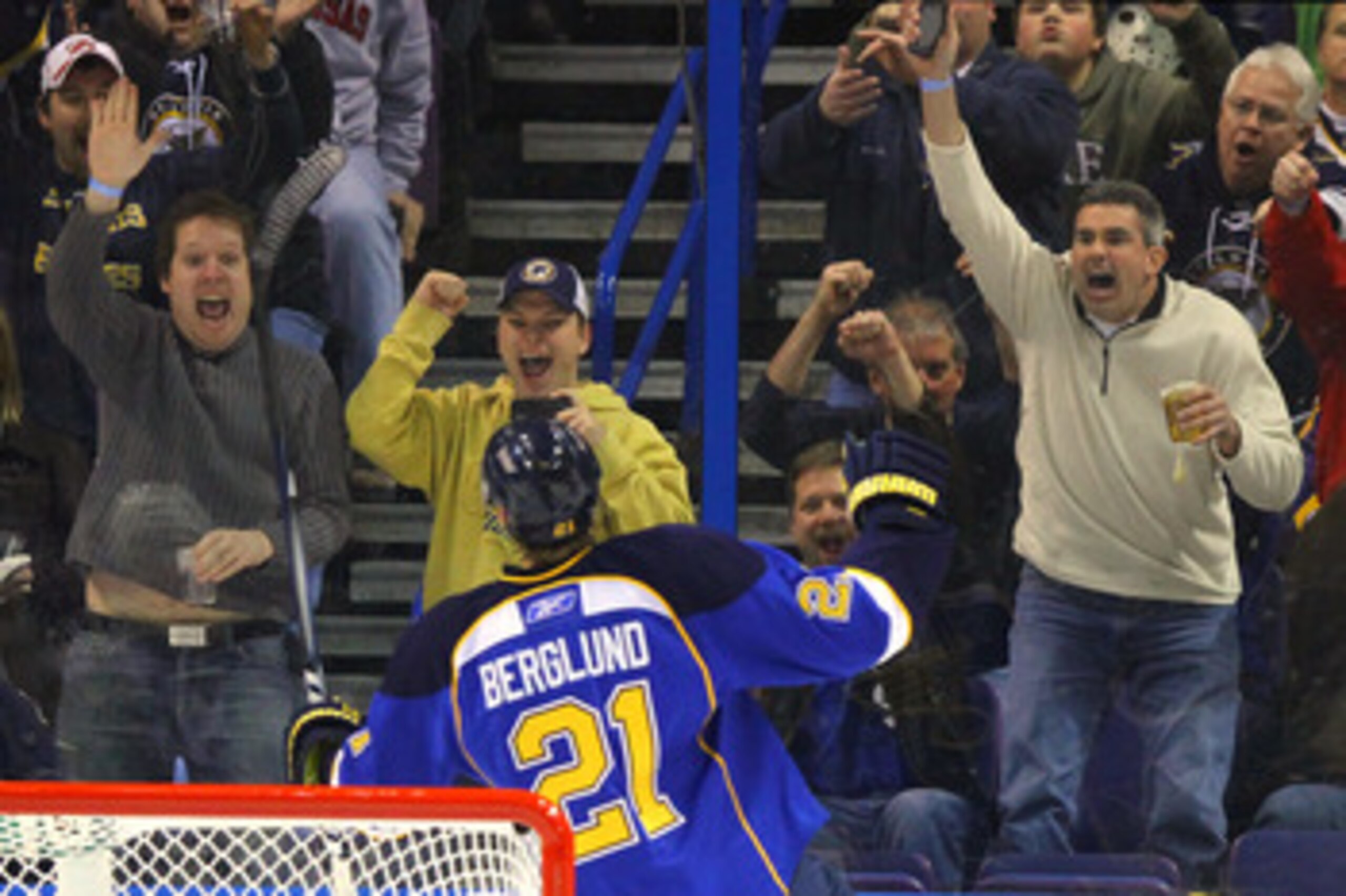 ST. LOUIS, MO - JANUARY 18: St. Louis Blues fans celebrate a goal by Patrik Berglund #21 of the St. Louis Blues against the Los Angeles Kings at the Scottrade Center on January 18, 2011 in St. Louis, Missouri.  (Photo by Dilip Vishwanat/Getty Images)