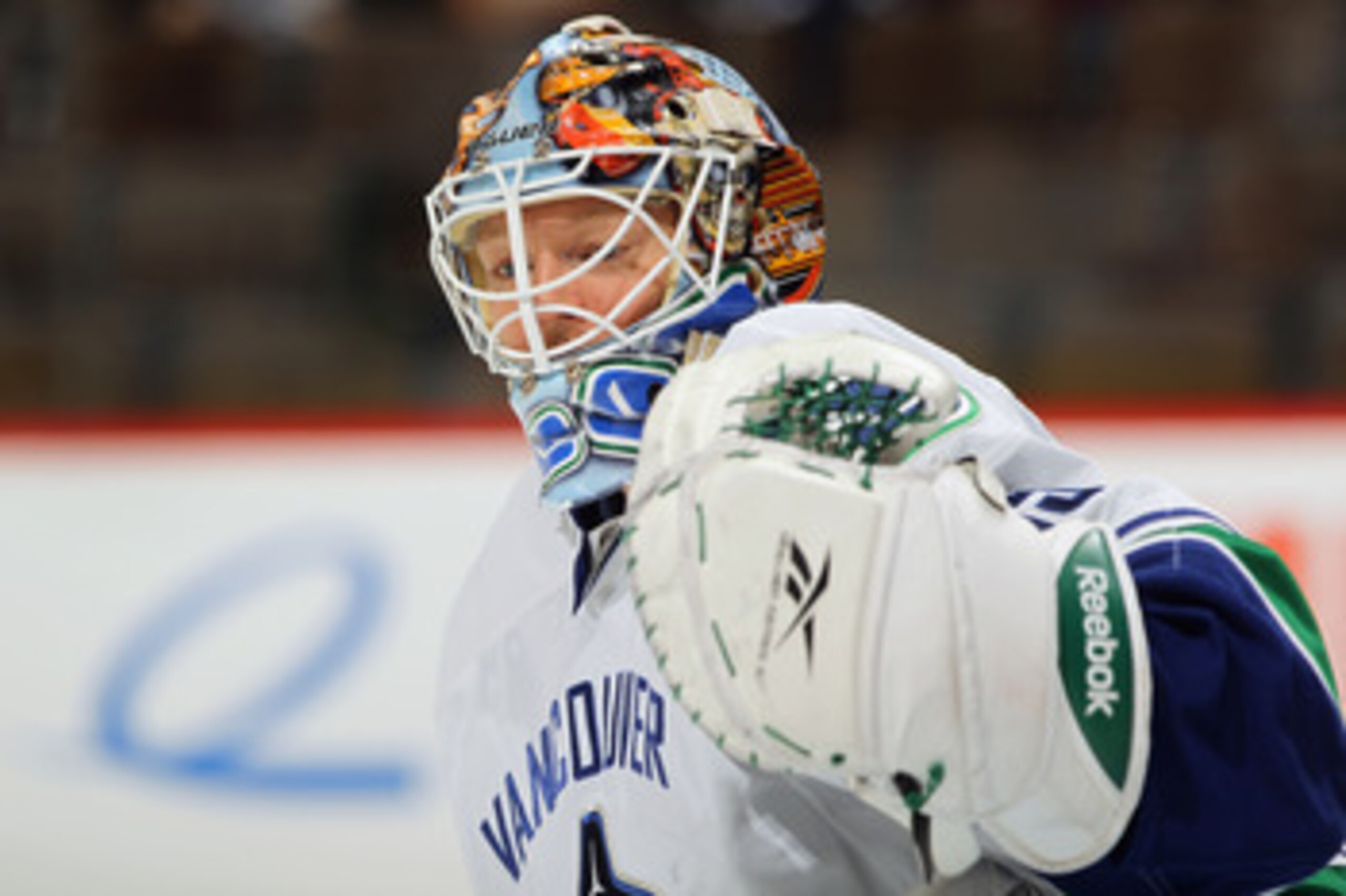 DENVER, CO - JANUARY 18:  Goalie Cory Schneider #35 of the Canucks looks on during warm up prior to facing the Colorado Avalanche at the Pepsi Center on January 18, 2011 in Denver, Colorado. The Avalanche defeated the Canucks 4-3 in overtime.  (Photo by D