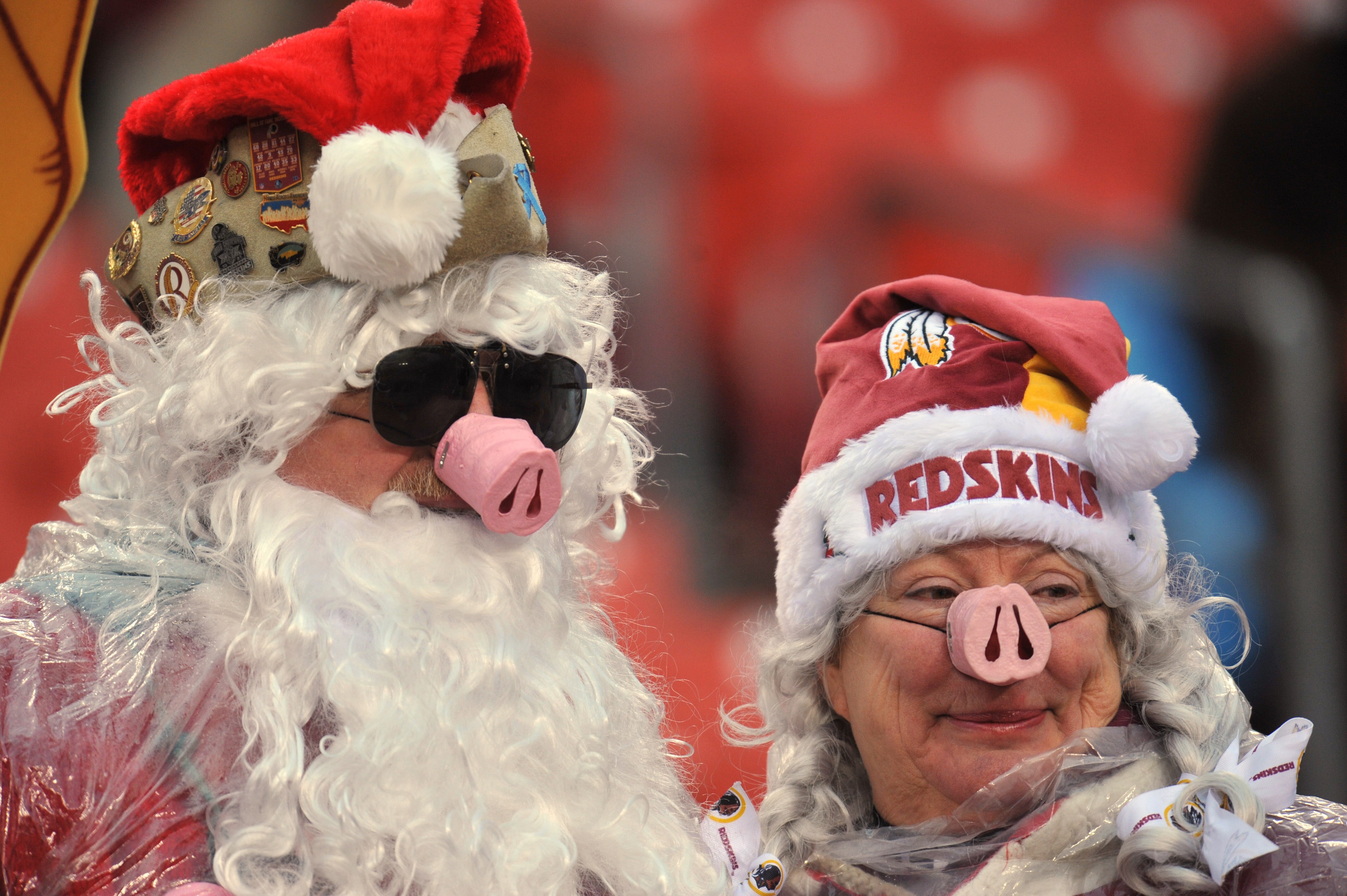 LANDOVER, MD - DECEMBER 12:  Fans of the Washington Redskins cheer against the Tampa Bay Buccaneers  at FedExField on December 12, 2010 in Landover, Maryland. The Buccaneers defeated the Redskins 17-16. (Photo by Larry French/Getty Images)