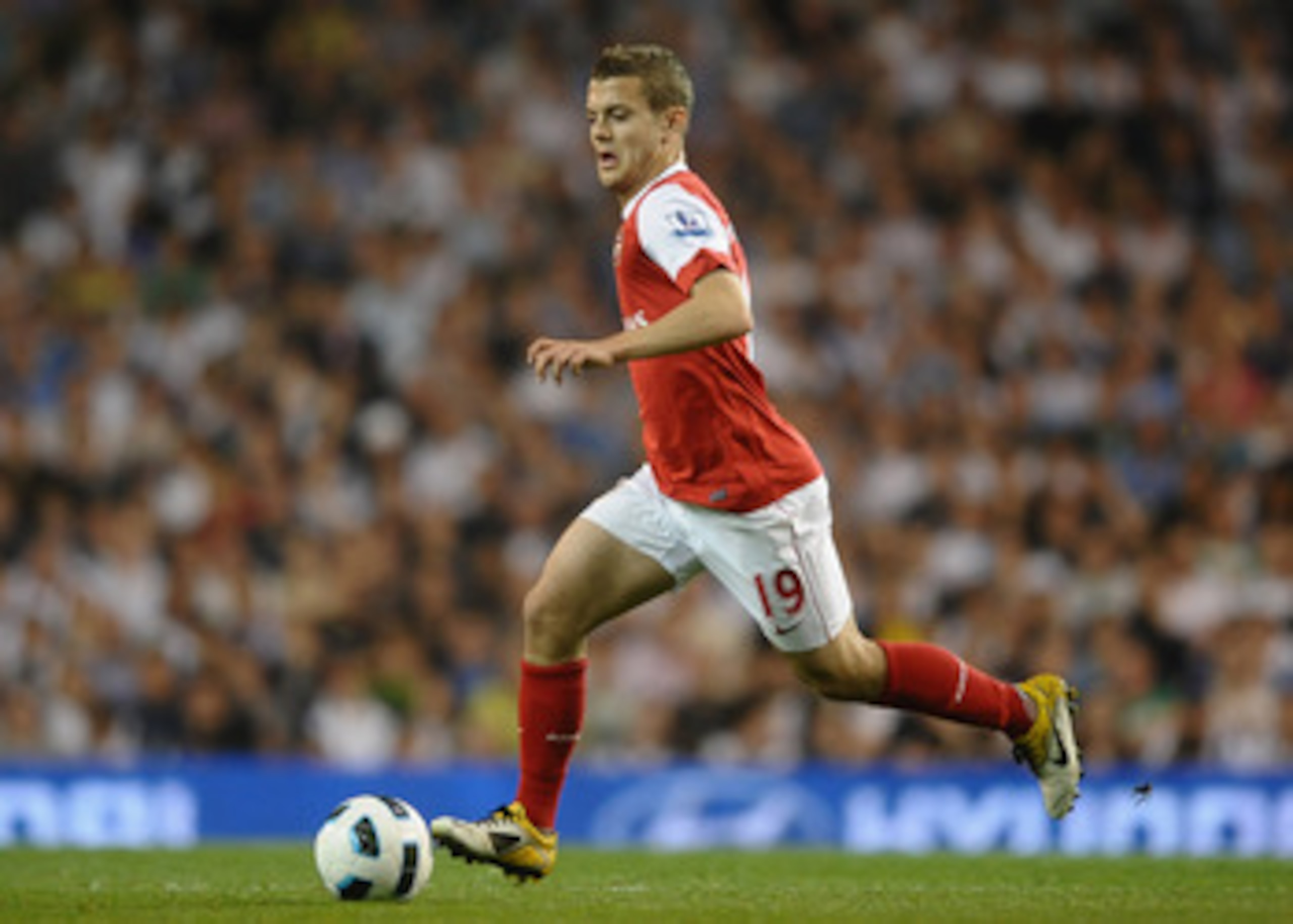 LONDON, ENGLAND - APRIL 20:  Jack Wilshere of Arsenal runs with the ball during the Barclays Premier League match between Tottenham Hotspur and Arsenal at White Hart Lane on April 20, 2011 in London, England.  (Photo by Laurence Griffiths/Getty Images)