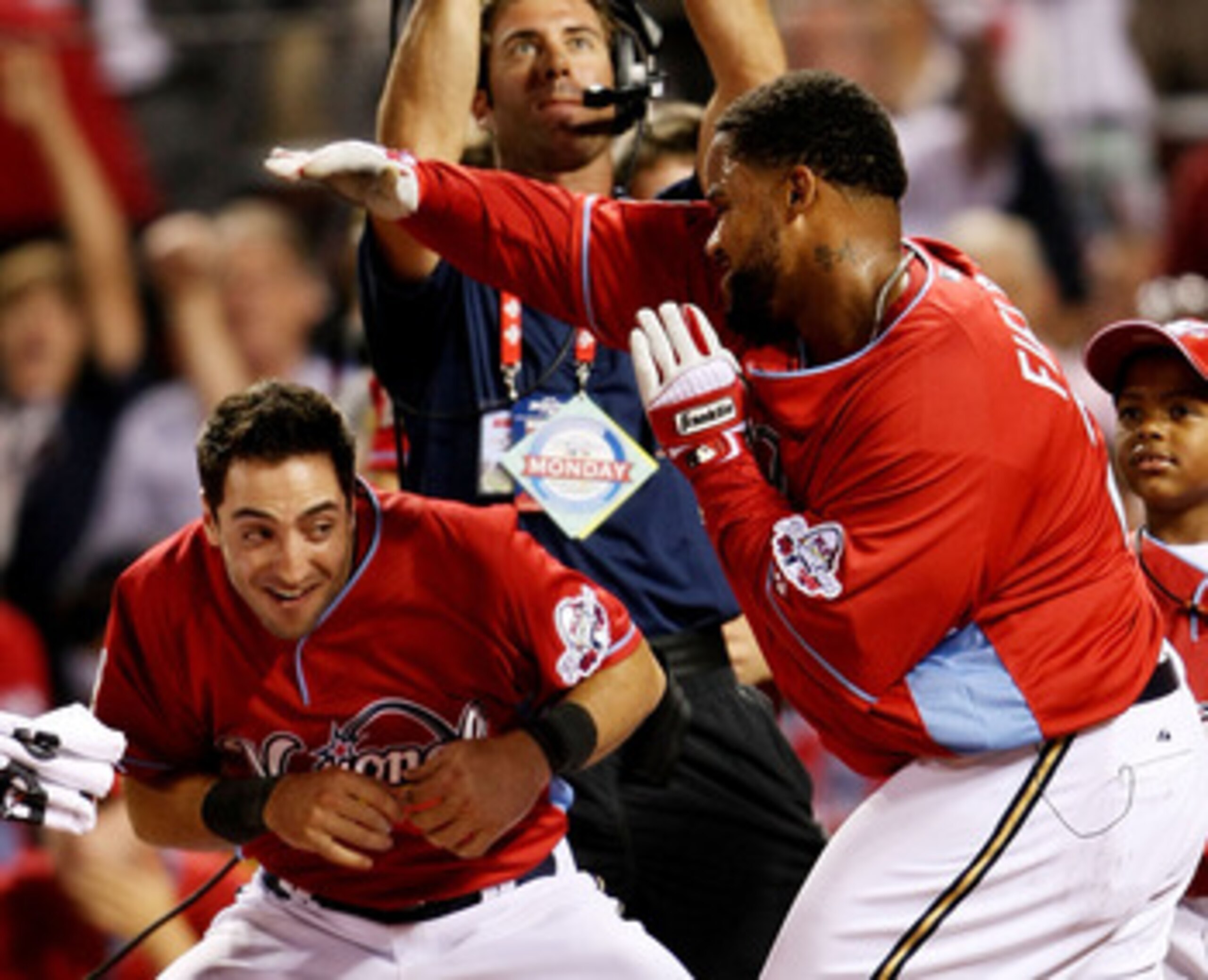 ST LOUIS, MO - JULY 13:  National League All-Star Prince Fielder of the Milwaukee Brewers celebrates with teammate Ryan Braun after winning the State Farm Home Run Derby at Busch Stadium on July 13, 2009 in St. Louis, Missouri.  (Photo by Elsa/Getty Image