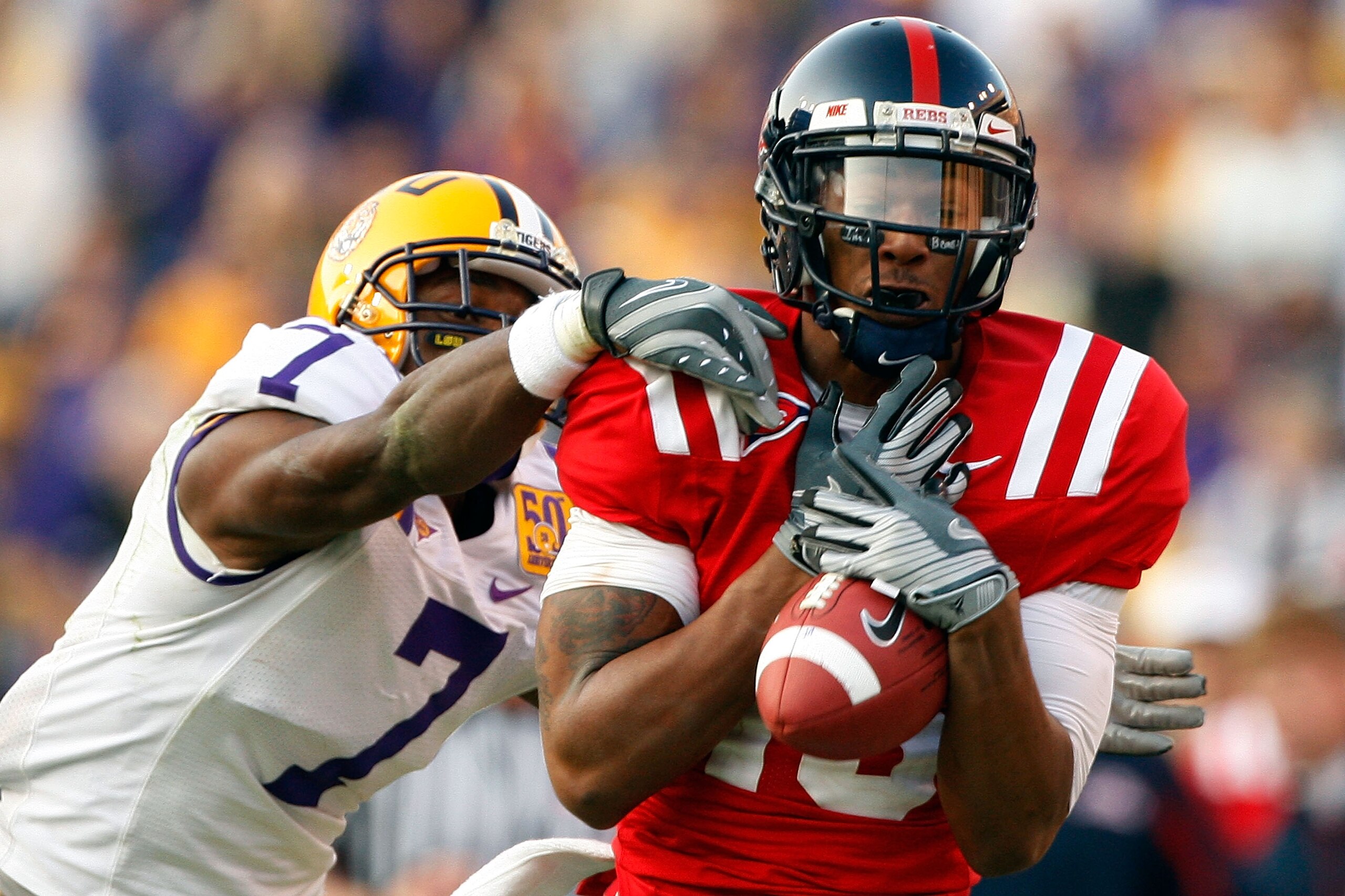 BATON ROUGE, LA - NOVEMBER 22:  Markeith Summers #16 of the Ole Miss Rebels is tackled by Patrick Peterson #7 of the Louisiana State University Tigers on November 22, 2008 at Tiger Stadium in Baton Rouge, Louisiana.  (Photo by Chris Graythen/Getty Images)