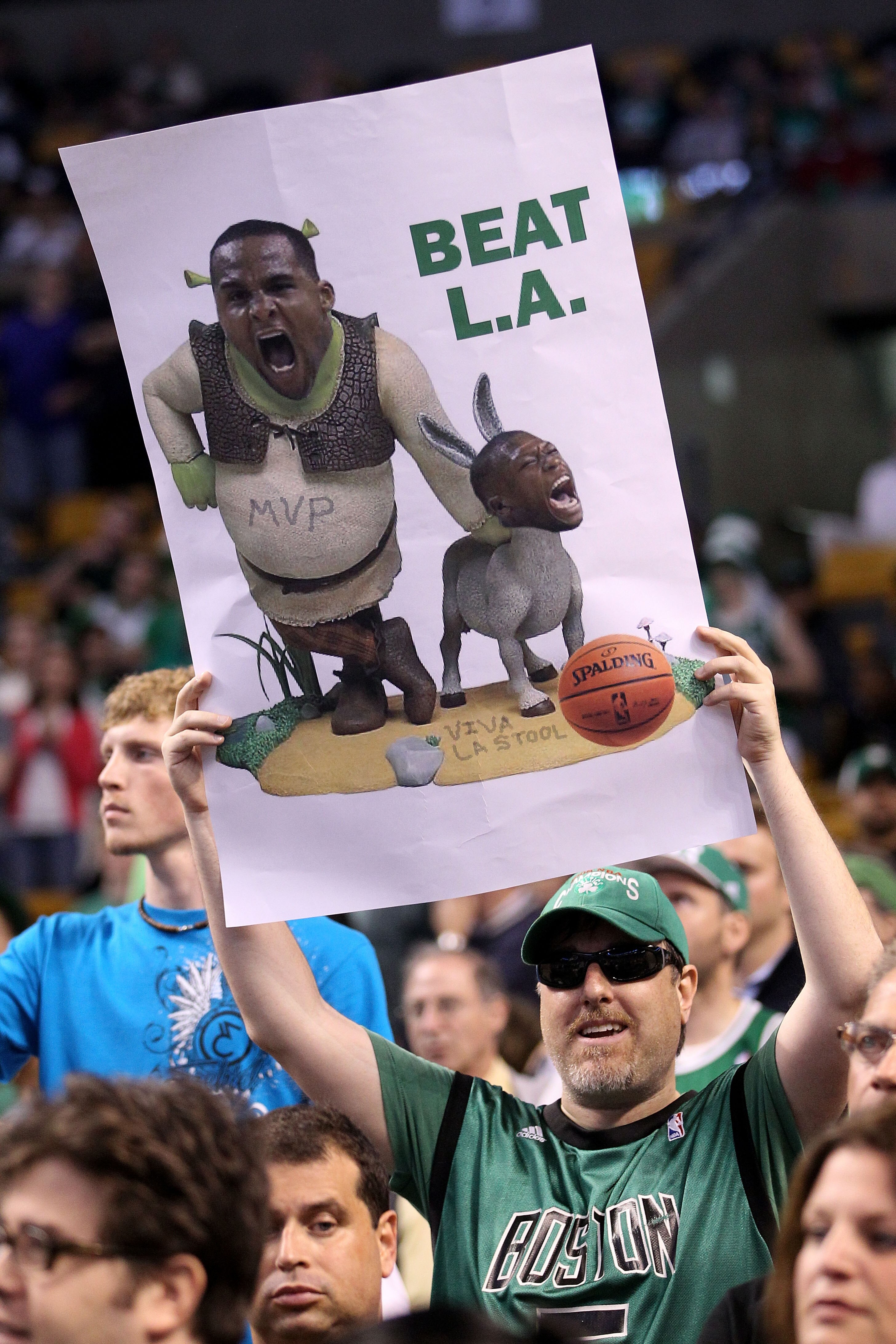 BOSTON - JUNE 13:  A fan of the Boston Celtics holds up a sign in reference to a Shrek and Donkey comment made by Glen Davis #11 and Nate Robinson #4 against the Los Angeles Lakers during Game Five of the 2010 NBA Finals on June 13, 2010 at TD Garden in B