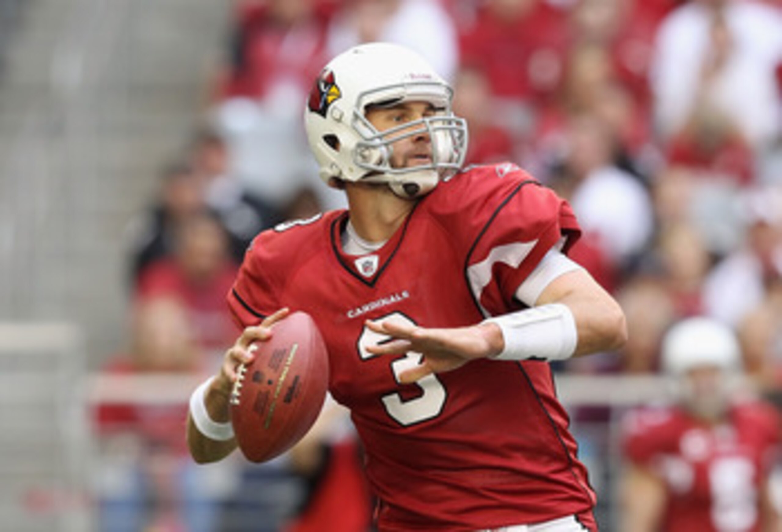 GLENDALE, AZ - DECEMBER 05:  Quarterback Derek Anderson #3 of the Arizona Cardinals scrambles to pass the football during the NFL game against the St. Louis Rams at the University of Phoenix Stadium on December 5, 2010 in Glendale, Arizona. The Rams defea