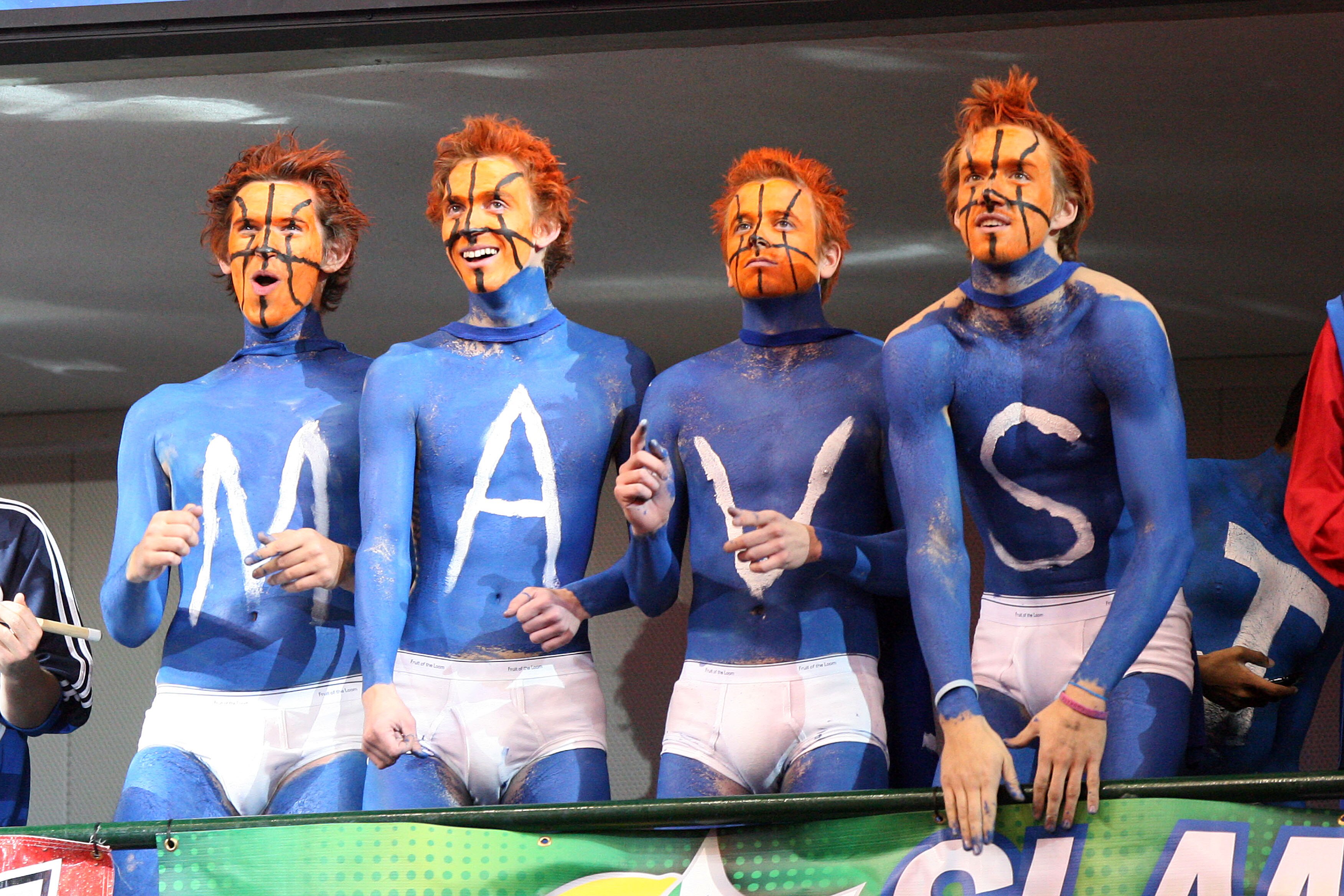 DALLAS - NOVEMBER 27: Dallas Mavericks fans cheer on their team against the Miami Heat on November 27, 2010 at the American Airlines Center in Dallas, Texas. NOTE TO USER: User expressly acknowledges and agrees that, by downloading and or using this Photo