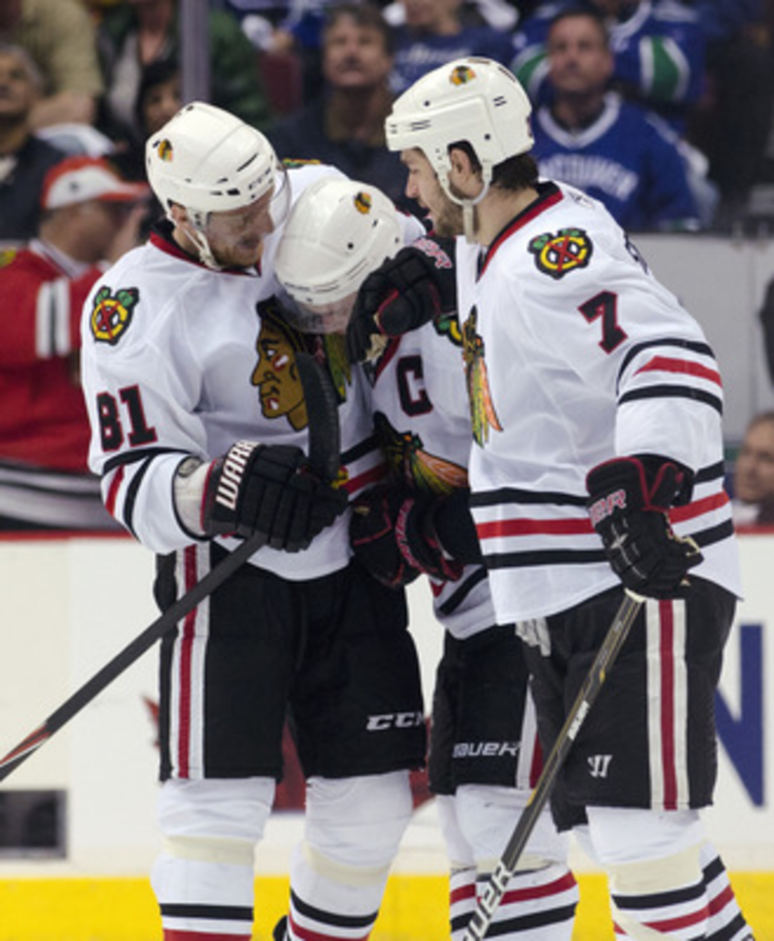 VANCOUVER, CANADA - APRIL 26: Jonathan Toews #19 of the Chicago Blackhawks is congratulated by Marian Hossa #81 and Brent Seabrook #7 after scoring the game tying goal during the third period in Game Seven of the Western Conference Quarterfinals during th VANCOUVER, CANADA - APRIL 26: Jonathan Toews #19 of the Chicago Blackhawks is congratulated by Marian Hossa #81 and Brent Seabrook #7 after scoring the game tying goal during the third period in Game Seven of the Western Conference Quarterfinals during th