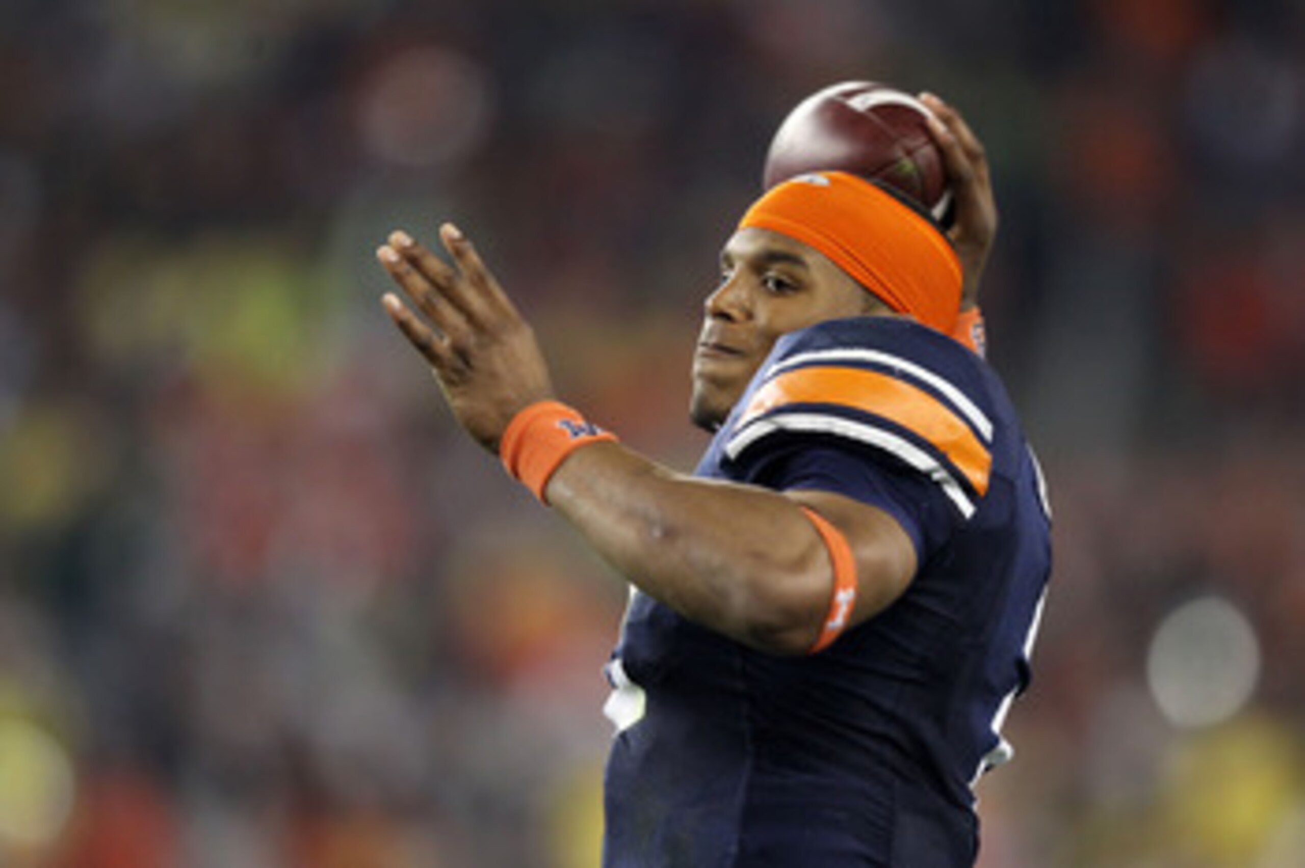 GLENDALE, AZ - JANUARY 10: Cameron Newton #2 of the Auburn Tigers warms up prior to their game against the Oregon Ducks during the Tostitos BCS National Championship Game at University of Phoenix Stadium on January 10, 2011 in Glendale, Arizona. (Photo GLENDALE, AZ - JANUARY 10: Cameron Newton #2 of the Auburn Tigers warms up prior to their game against the Oregon Ducks during the Tostitos BCS National Championship Game at University of Phoenix Stadium on January 10, 2011 in Glendale, Arizona. (Photo