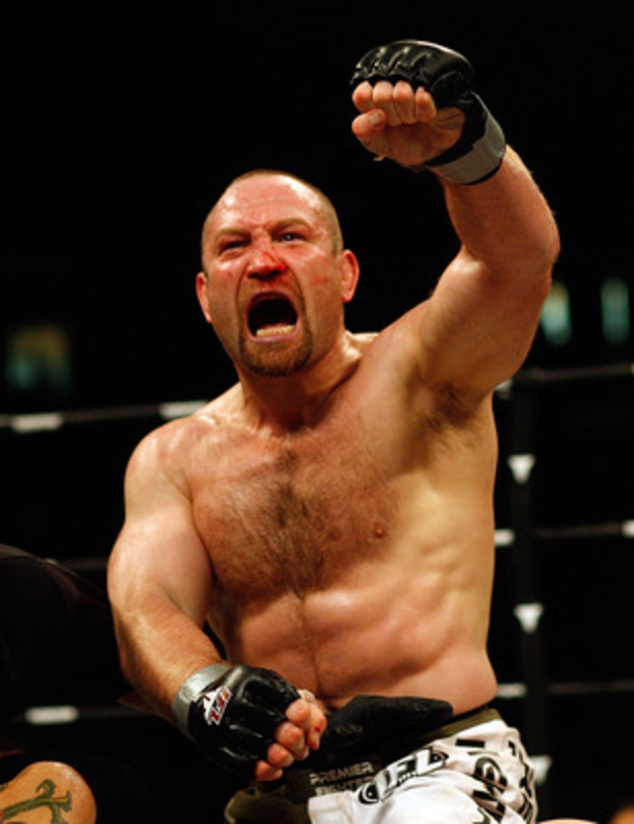 EAST RUTHERFORD, NJ - APRIL 04:  Vladimir Matyushenko in the green and white trunks of Midwest Combat celebrates defeating Jamal Patterson of the Renzo Gracie Jiu-Jitsu in the International Fighting League match at the Izod Center on April 4, 2008 in East
