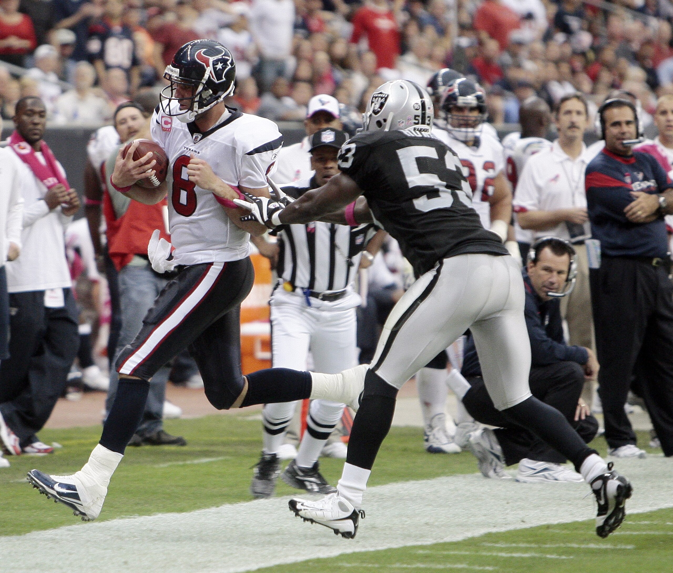 HOUSTON - OCTOBER 04: Quarterback Matt Schaub #8 of the Houston Texans is pushed out of bounds by linebacker Thomas Howard #53 of the Oakland Raiders at Reliant Stadium on October 4, 2009 in Houston, Texas. (Photo by Bob Levey/Getty Images) HOUSTON - OCTOBER 04: Quarterback Matt Schaub #8 of the Houston Texans is pushed out of bounds by linebacker Thomas Howard #53 of the Oakland Raiders at Reliant Stadium on October 4, 2009 in Houston, Texas. (Photo by Bob Levey/Getty Images)