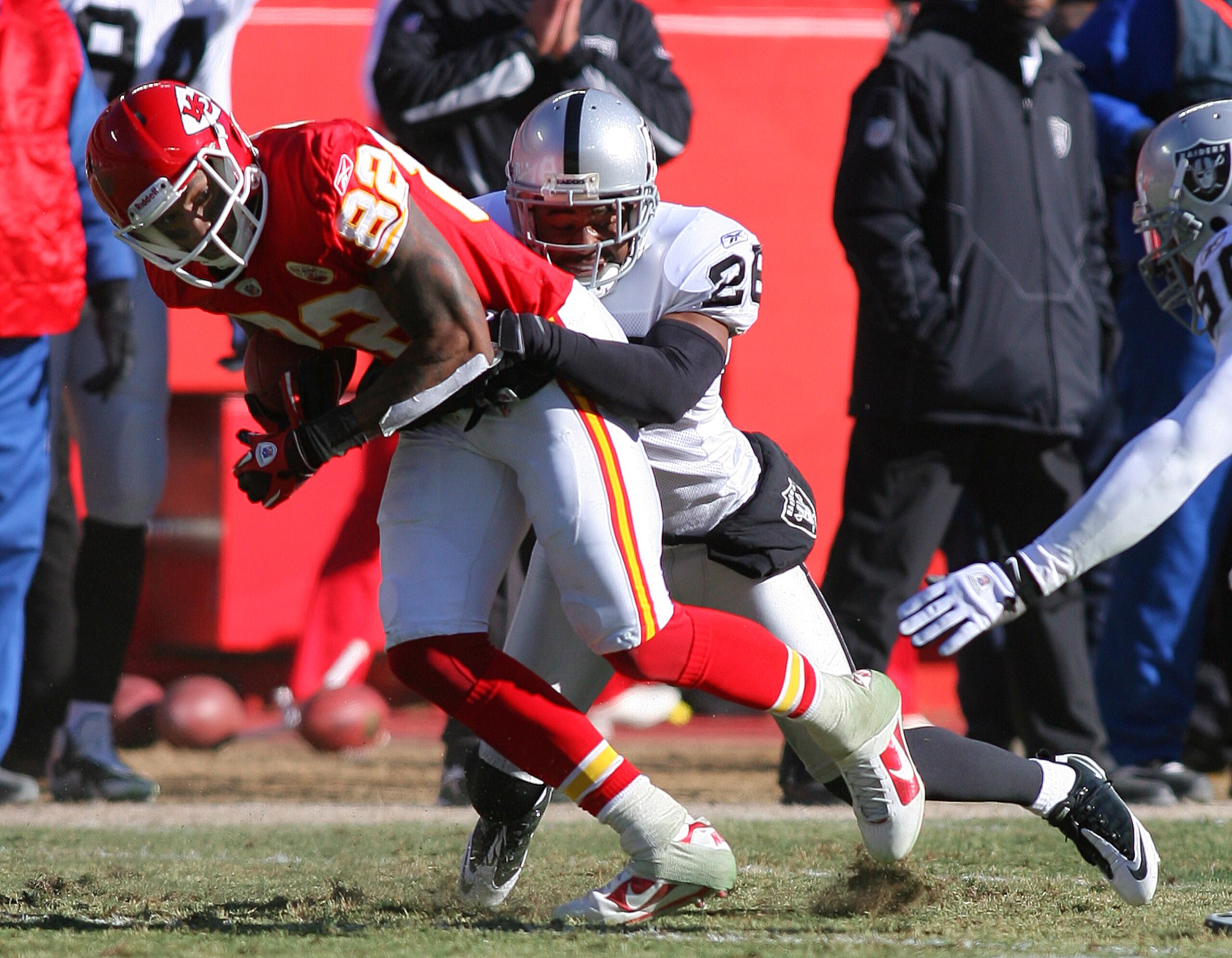 KANSAS CITY, MO - JANUARY 02: Wide receiver Dwayne Bowe #82 of the Kansas City Chiefs is tackled by Stanford Routt #26 of the Oakland Raiders in a game at Arrowhead Stadium on January 2, 2011 in Kansas City, Missouri. (Photo by Tim Umphrey/Getty Images) KANSAS CITY, MO - JANUARY 02: Wide receiver Dwayne Bowe #82 of the Kansas City Chiefs is tackled by Stanford Routt #26 of the Oakland Raiders in a game at Arrowhead Stadium on January 2, 2011 in Kansas City, Missouri. (Photo by Tim Umphrey/Getty Images)