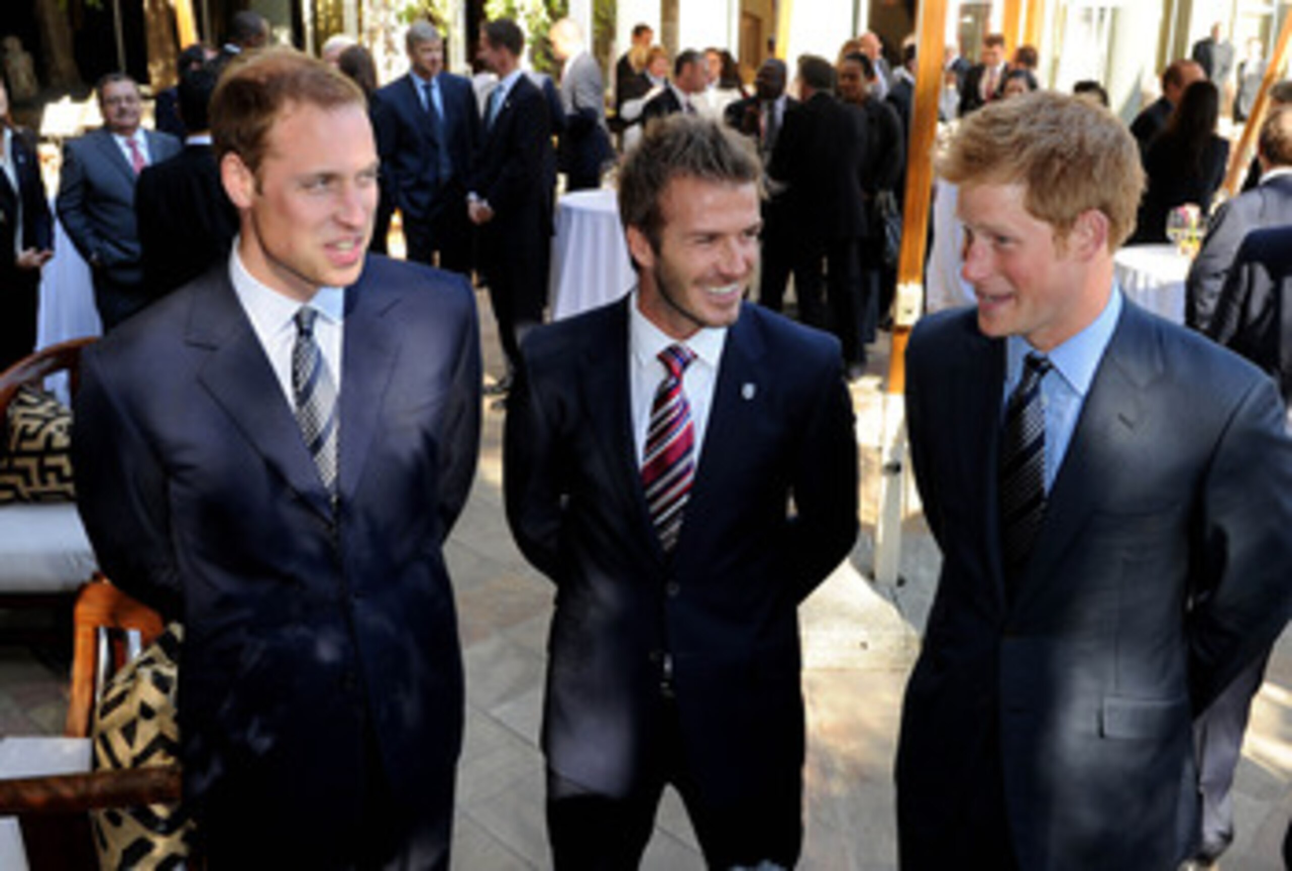 JOHANNESBERG, SOUTH AFRICA - JUNE 19:  Prince William  speaks to David Beckham (C) and Prince Harry (R) at an FA reception at the Saxon Hotel on June 19, 2010 in Johannesberg, South Africa. (Photo by Luca Ghidoni - Pool/Getty Images)