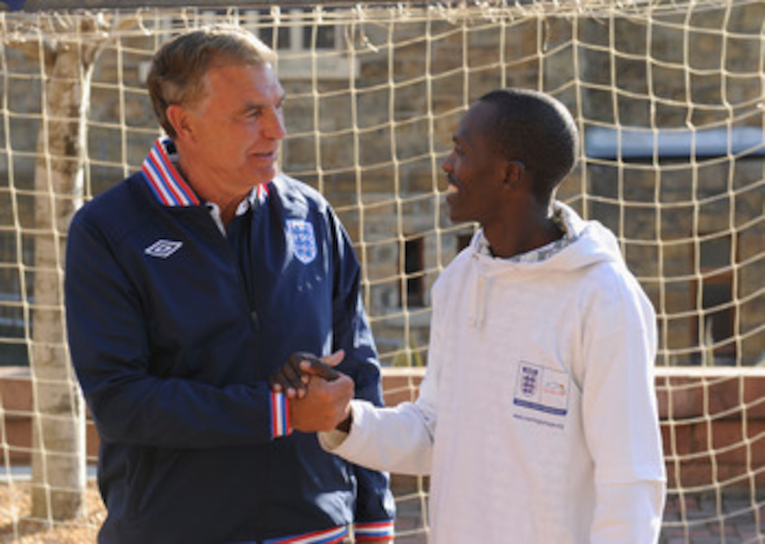CAPE TOWN, SOUTH AFRICA - JUNE 17: In this handout image supplied by the FA, Secretary of State Jeremy Hunt  (not pictured)  and Sir Trevor Brooking visit Coaching for Hope at Cape Peninsula University of Technology on June 17, 2010 in Cape Town, South Af