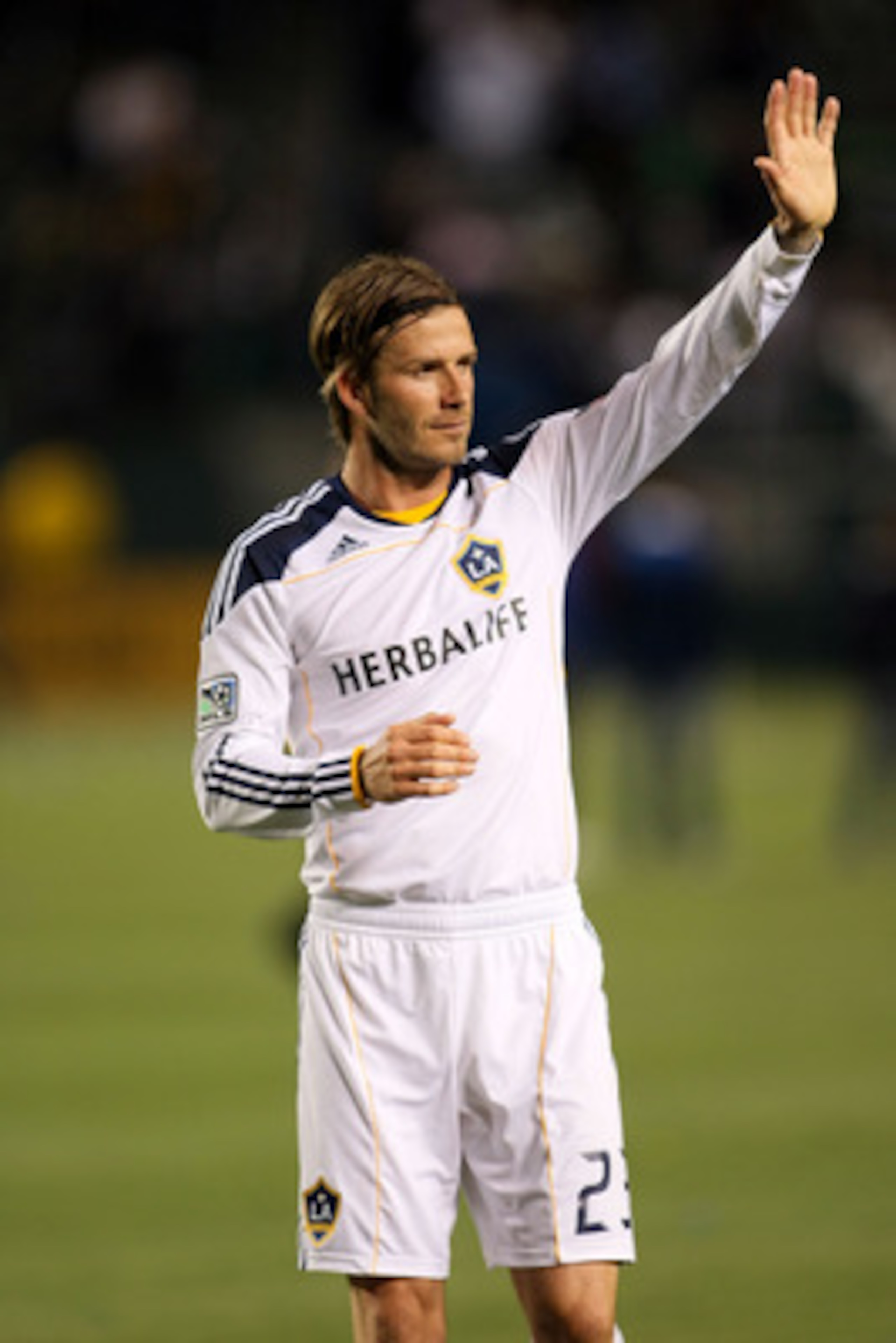CARSON, CA - APRIL 23:  David Beckham #23 of the Los Angeles Galaxy waves to the fans after the Galaxy defeated the Portland Timbers 3-0 in their MLS match at The Home Depot Center on April 23, 2011 in Carson, California.  (Photo by Victor Decolongon/Gett