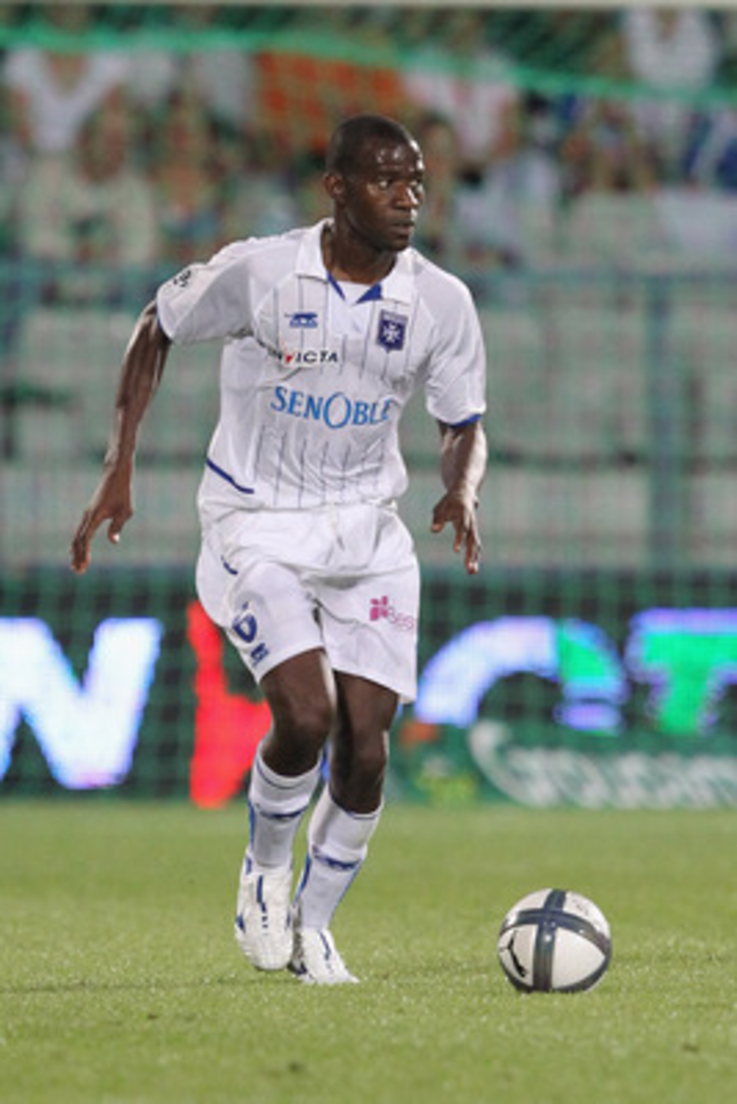 AUXERRE, FRANCE - AUGUST 07:  Adama  Coulibaly of Auxerre in action during the Ligue 1 match between Auxerre and Lorient at Abbe-Deschamp Stadium on August 7, 2010 in Auxerre, France.  (Photo by Julien M. Hekimian/Getty Images)