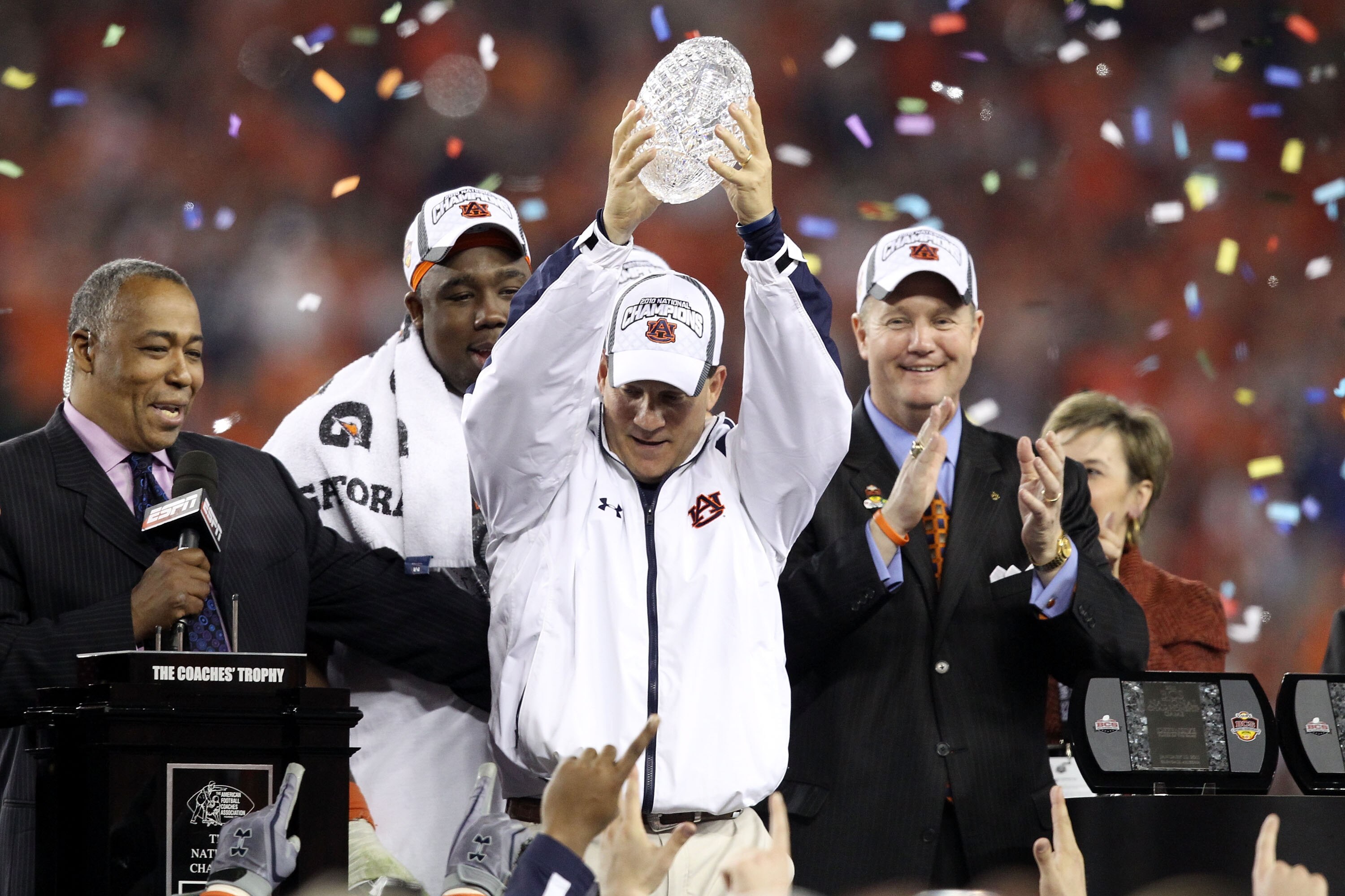 GLENDALE, AZ - JANUARY 10:  Head coach Gene Chizik of the Auburn Tigers celebrates the Tigers 22-19 victory against the Oregon Ducks during the Tostitos BCS National Championship Game at University of Phoenix Stadium on January 10, 2011 in Glendale, Arizo