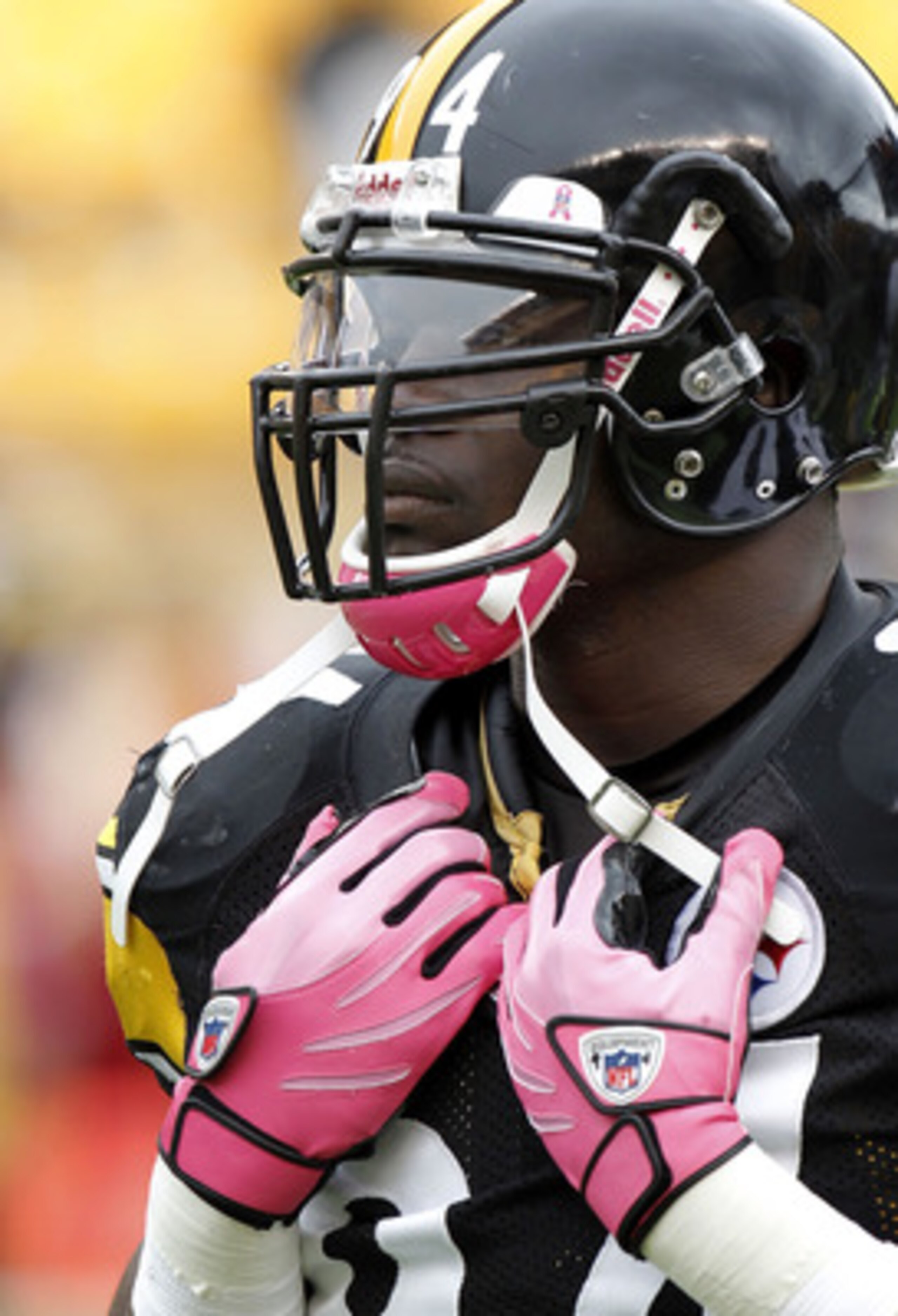 PITTSBURGH - OCTOBER 03:  Lawrence Timmons #94 of the Pittsburgh Steelers wears a pink chin strap and gloves for breast cancer awareness prior to playing the Baltimore Ravens on October 3, 2010 at Heinz Field in Pittsburgh, Pennsylvania.  (Photo by Gregor