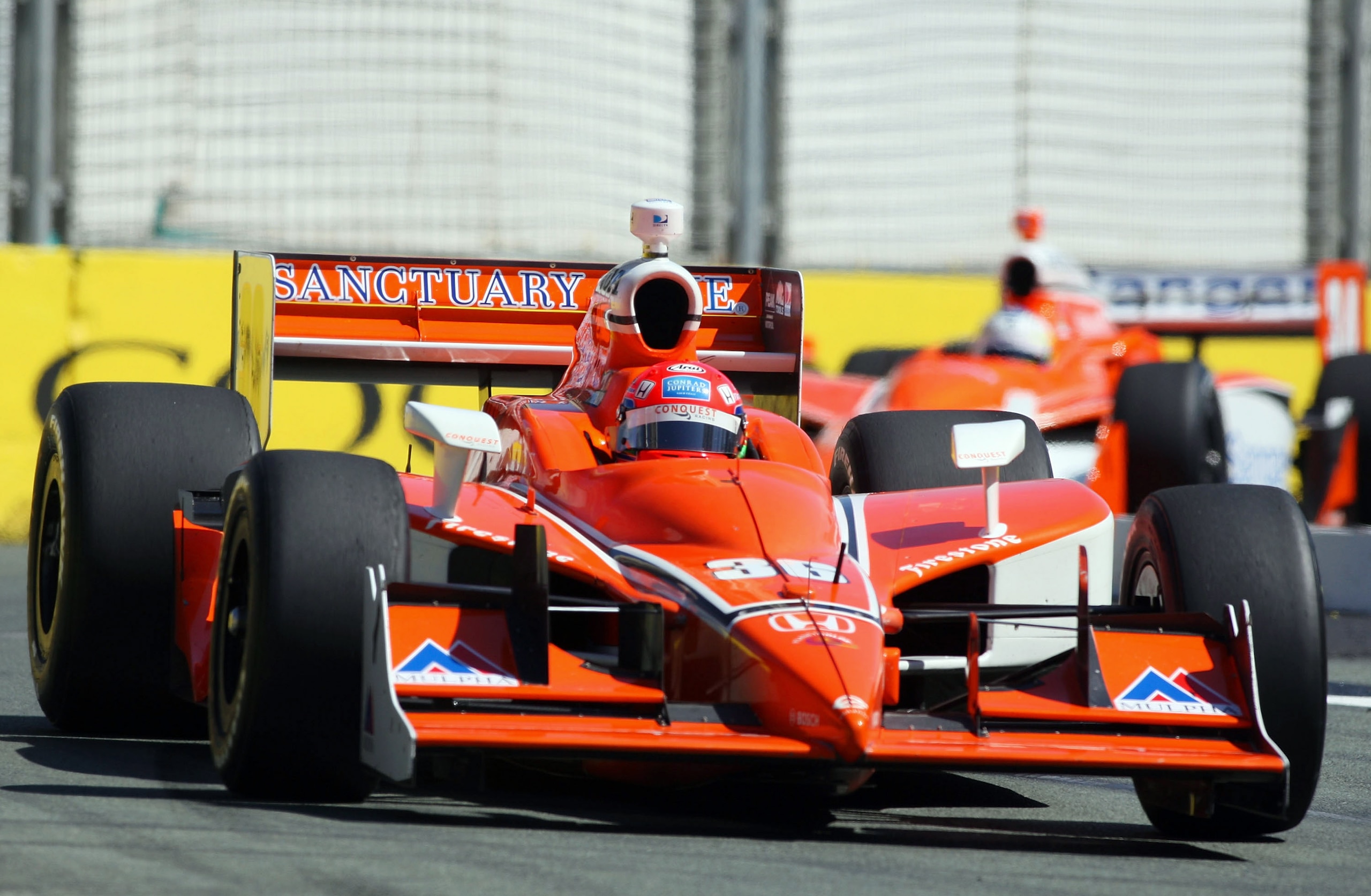 GOLD COAST, AUSTRALIA - OCTOBER 24: Alex Tagliani, driver of the #36 Conquest Racing Dallara Honda rounds a corner during practice for the IRL Indy Car Series Nikon Indy 300 on October 24, 2008 on the Gold Coast, Australia. (Photo by Bradley Kanaris/Ge GOLD COAST, AUSTRALIA - OCTOBER 24: Alex Tagliani, driver of the #36 Conquest Racing Dallara Honda rounds a corner during practice for the IRL Indy Car Series Nikon Indy 300 on October 24, 2008 on the Gold Coast, Australia. (Photo by Bradley Kanaris/Ge