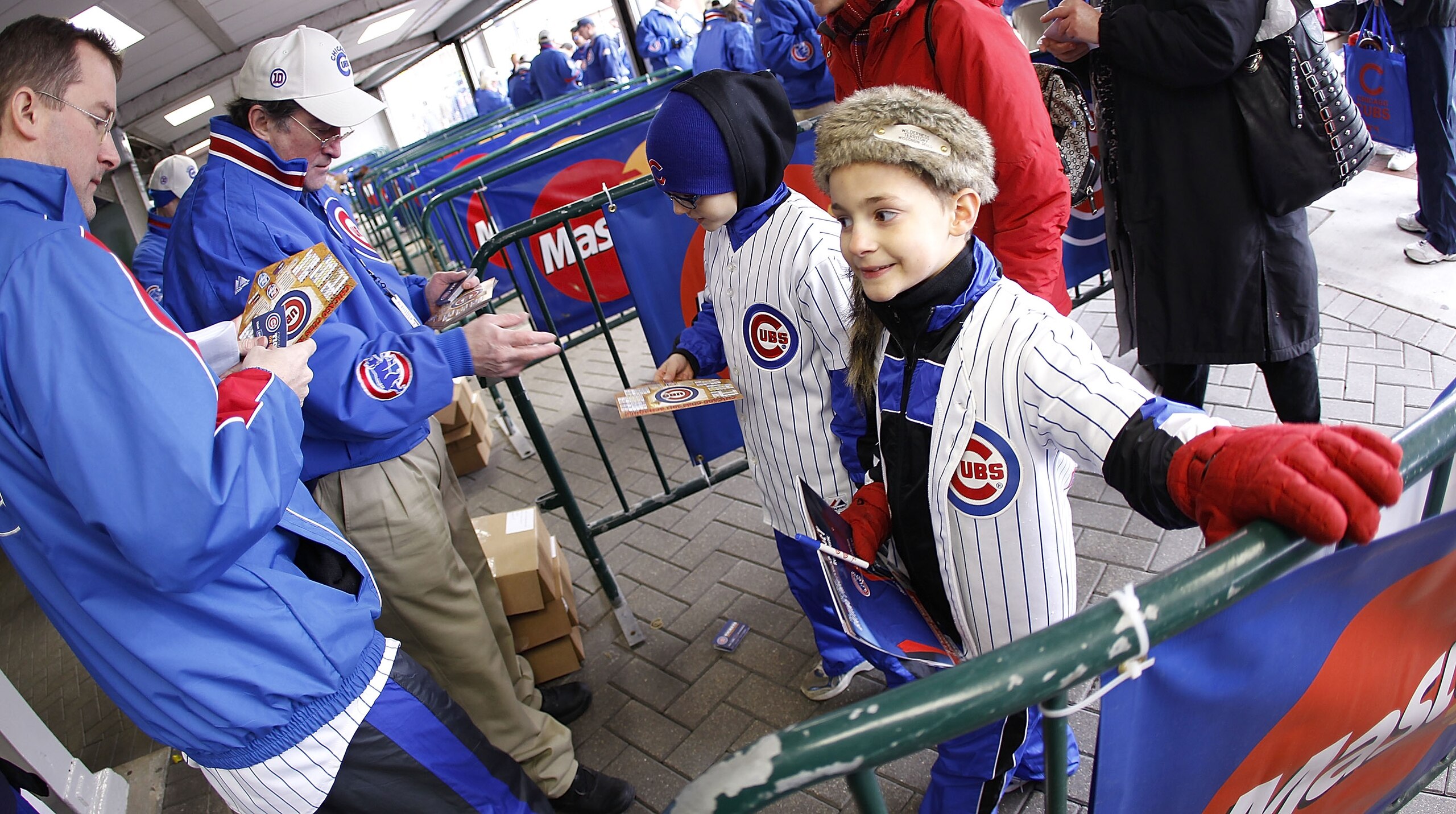 CHICAGO, IL - APRIL 01:  Fans enter the stadium prior to the Chicago Cubs playing the Pittsburgh Pirates on opening day at Wrigley Field on April 1, 2011 in Chicago, Illinois.  (Photo by Gregory Shamus/Getty Images)